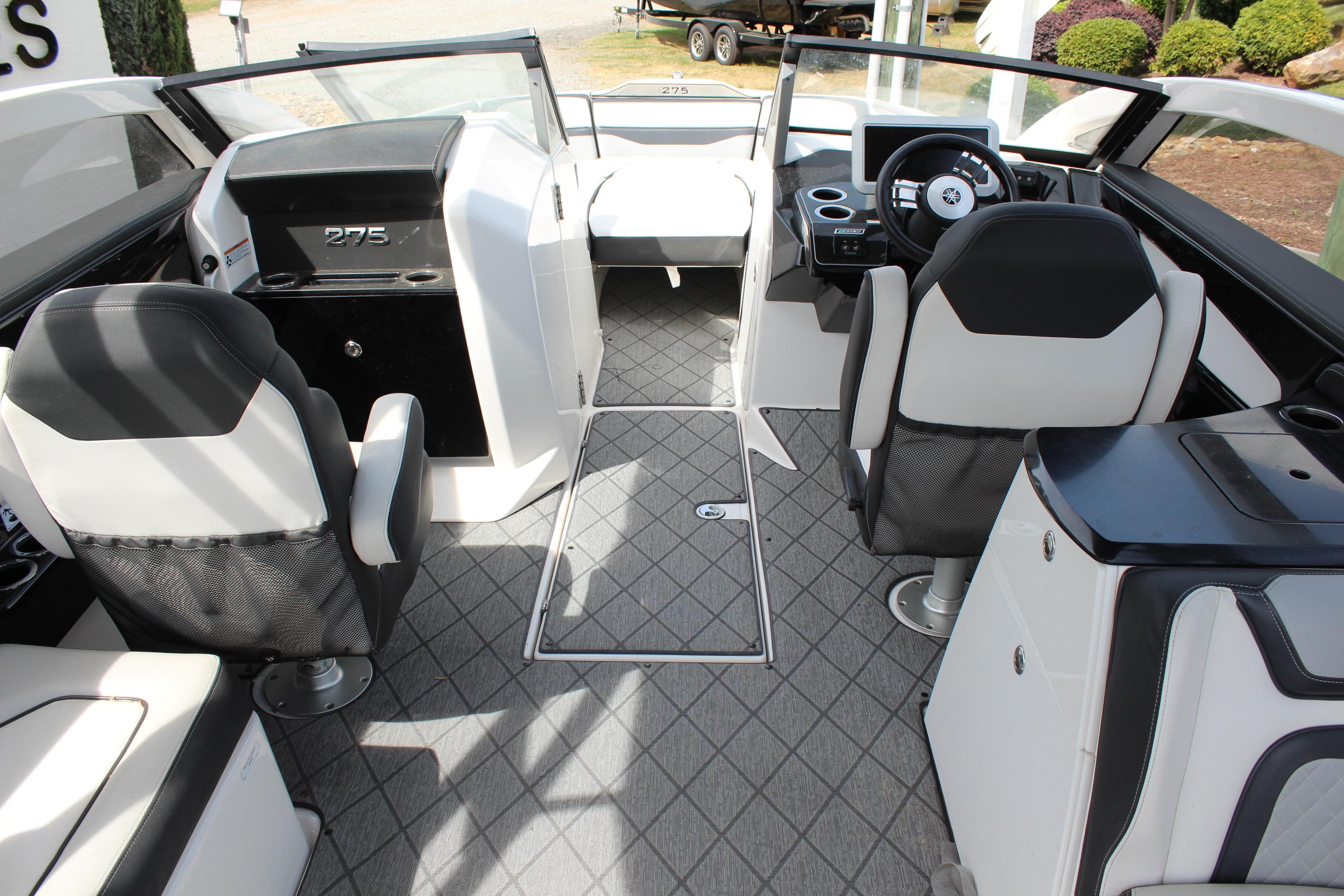 2020 Yamaha Boats 275SE interior with modern seating and sleek dashboard design.