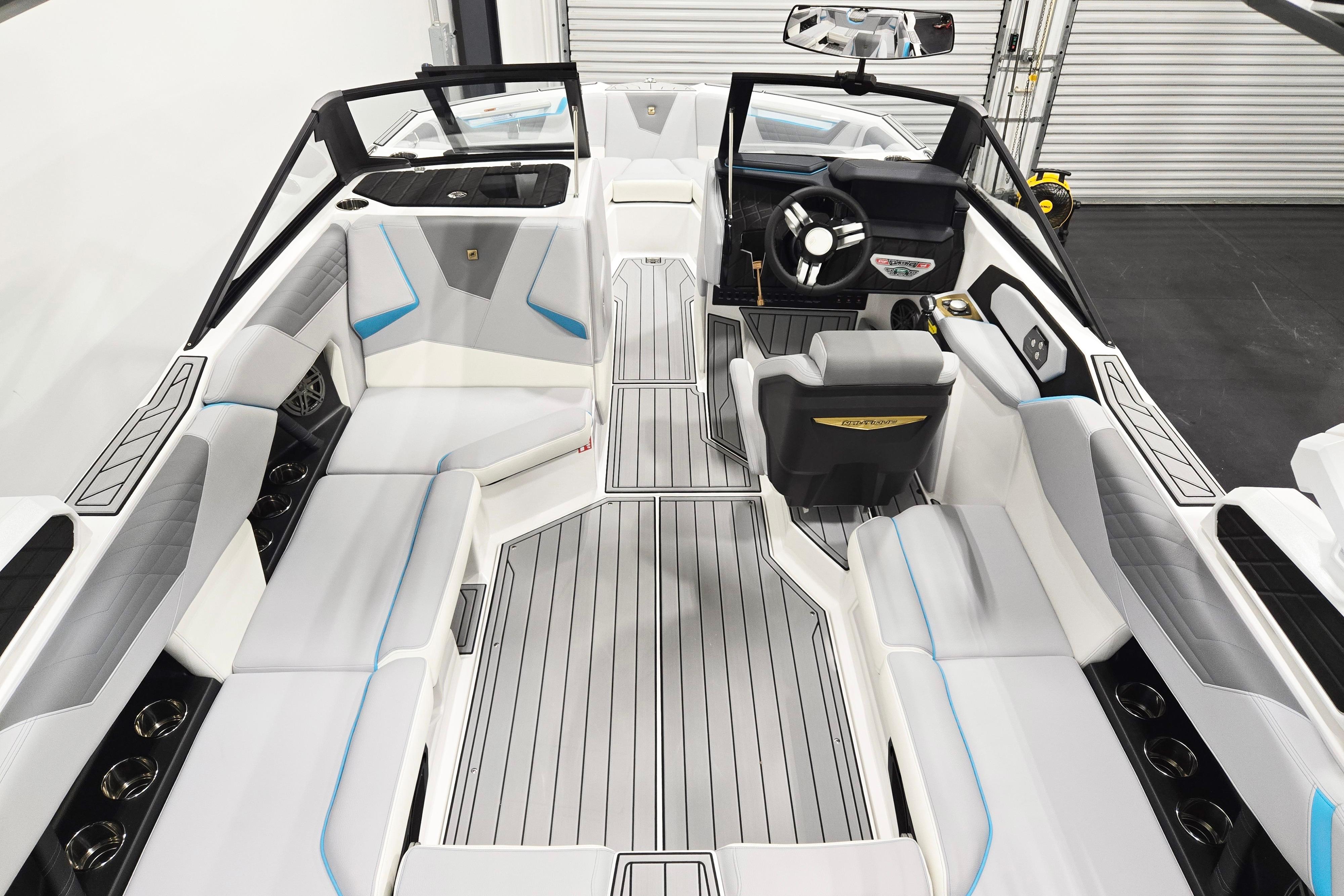 Interior of 2026 Nautique Super Air Nautique S21 boat, featuring sleek seating and modern design.
