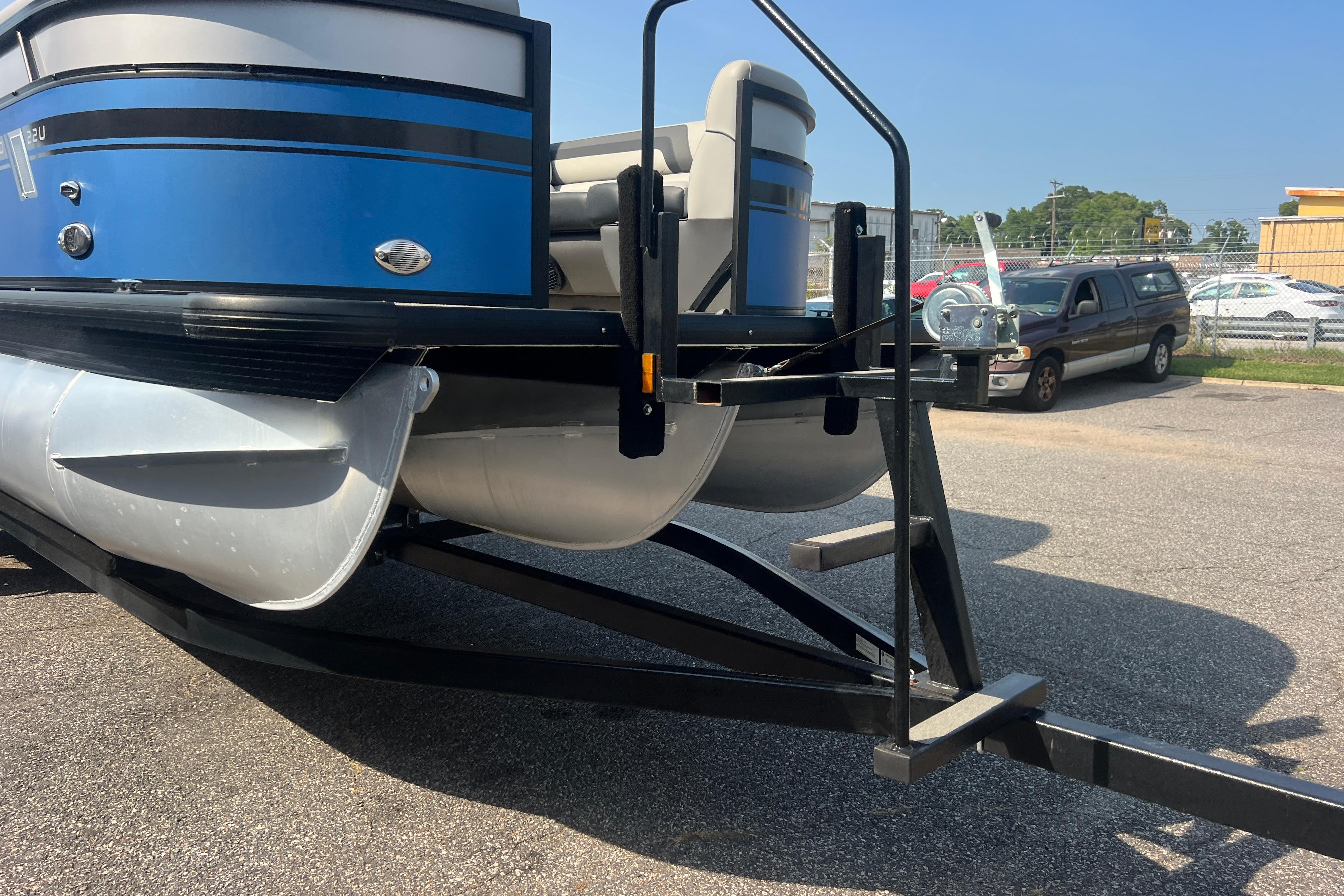 2022 Viaggio Lago V-U 22 pontoon boat on trailer, parked outdoors.