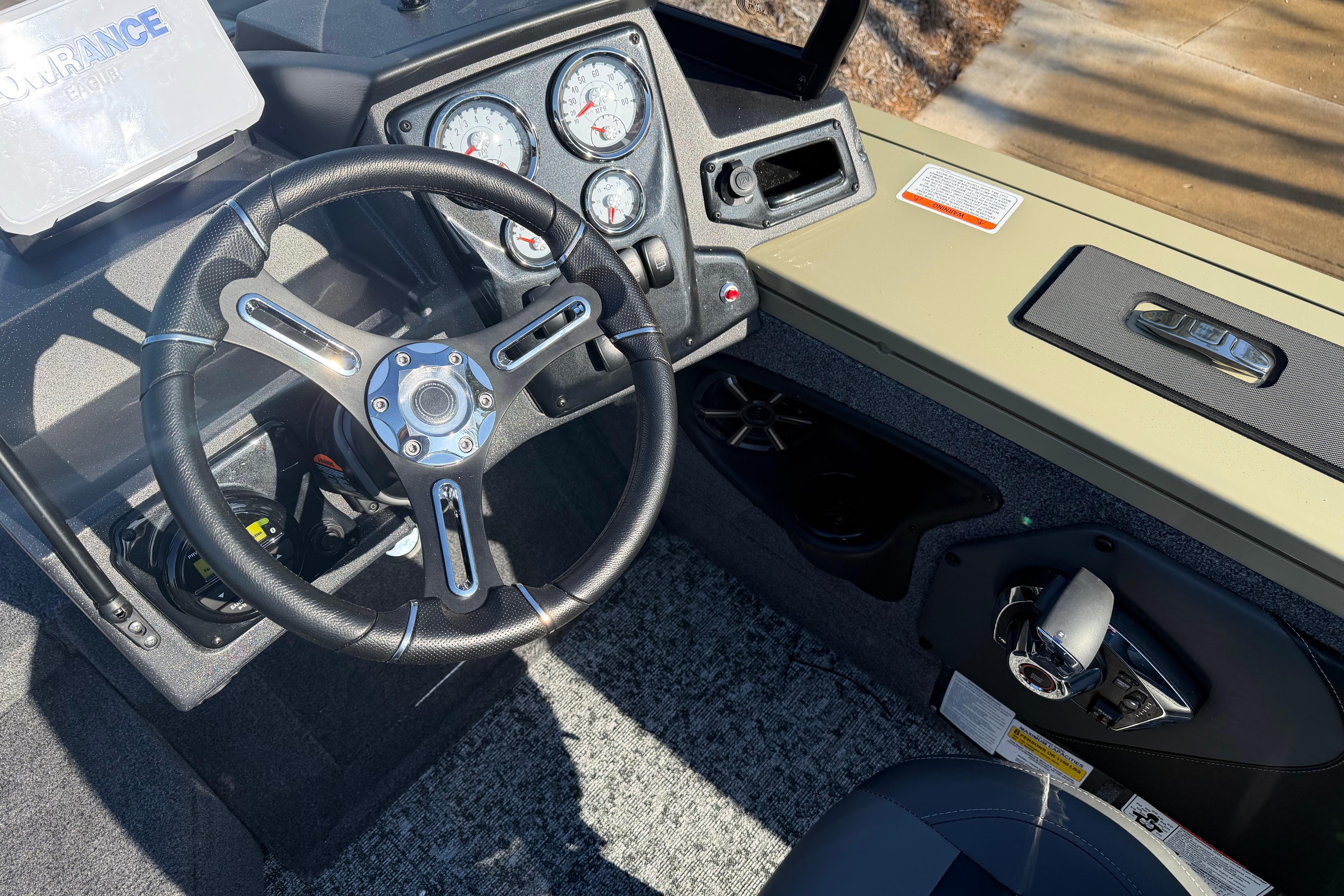 2026 Tracker Targa V-19 Combo boat dashboard with steering wheel and gauges.