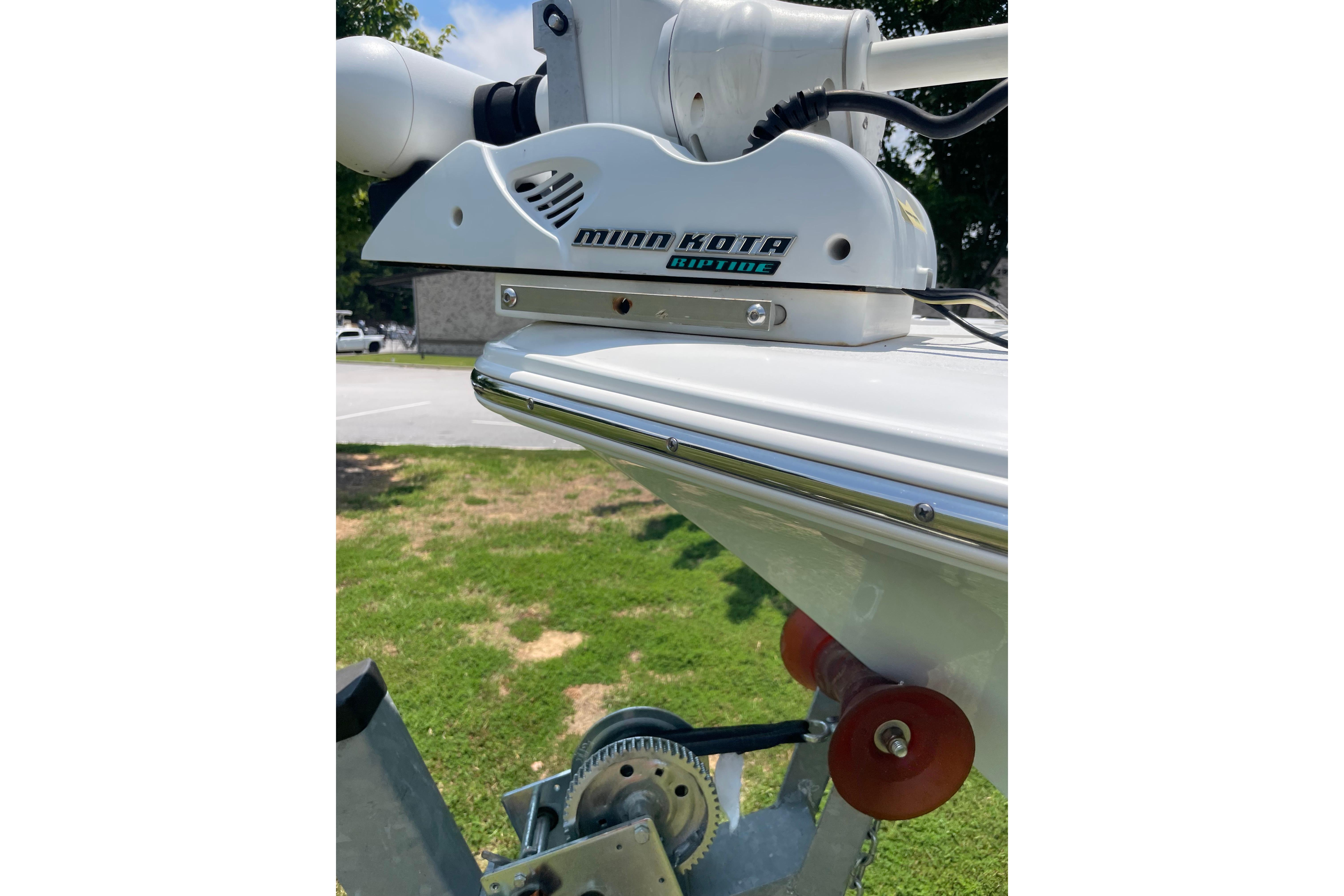 Minn Kota Riptide motor on 2018 Sea Hunt Ultra 234 boat, parked outdoors.
