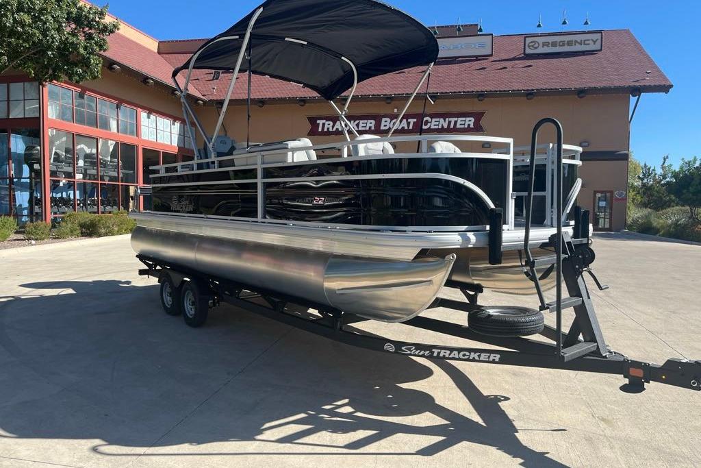 2026 Sun Tracker Fishin' Barge 22 DLX pontoon boat at Tracker Boat Center.