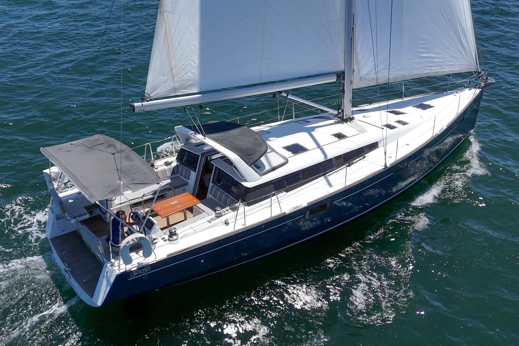 2017 Beneteau Sense 50 sailing yacht cruising on open water.