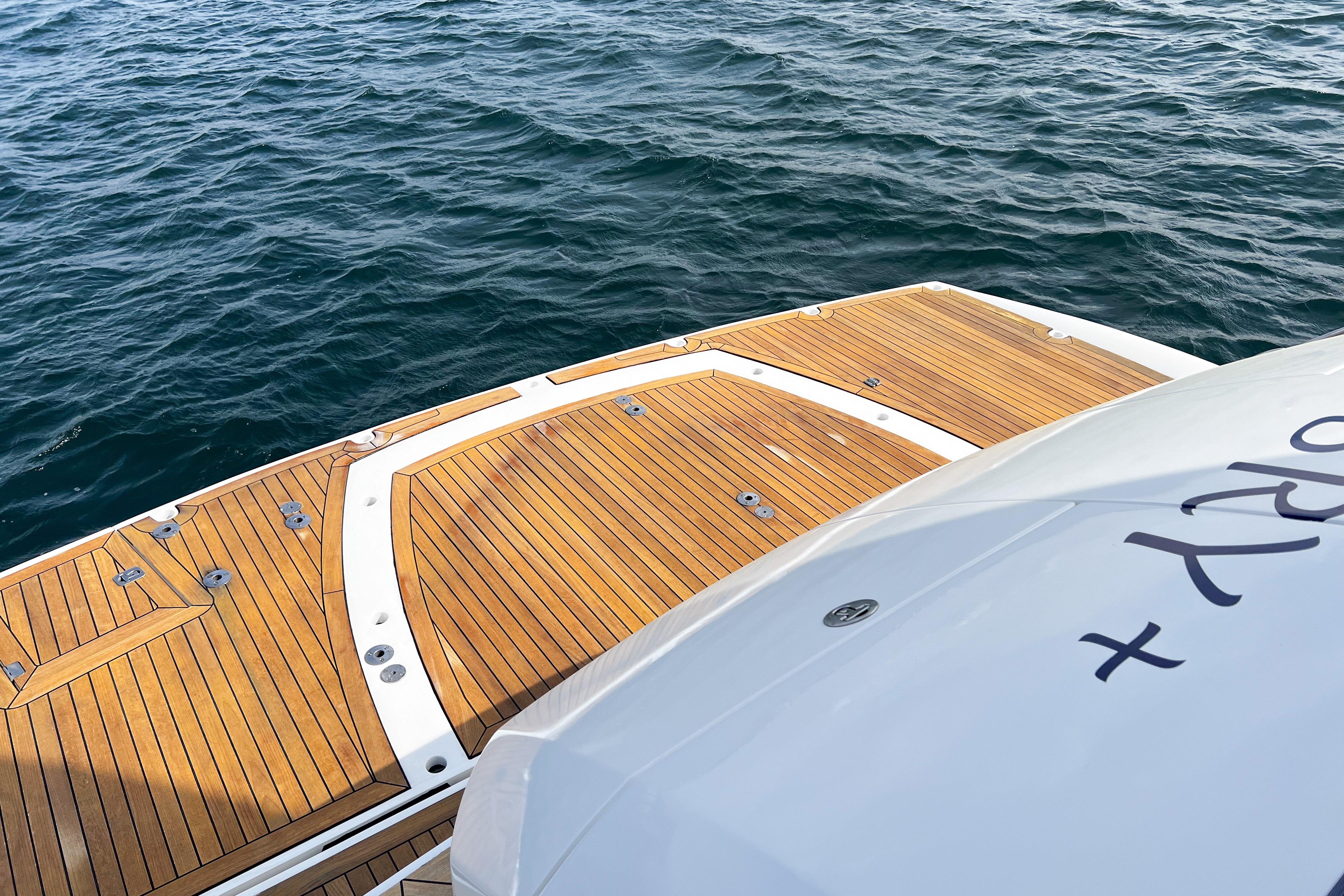 Sunseeker Manhattan 66 yacht deck, 2007 model, overlooking calm ocean waters.