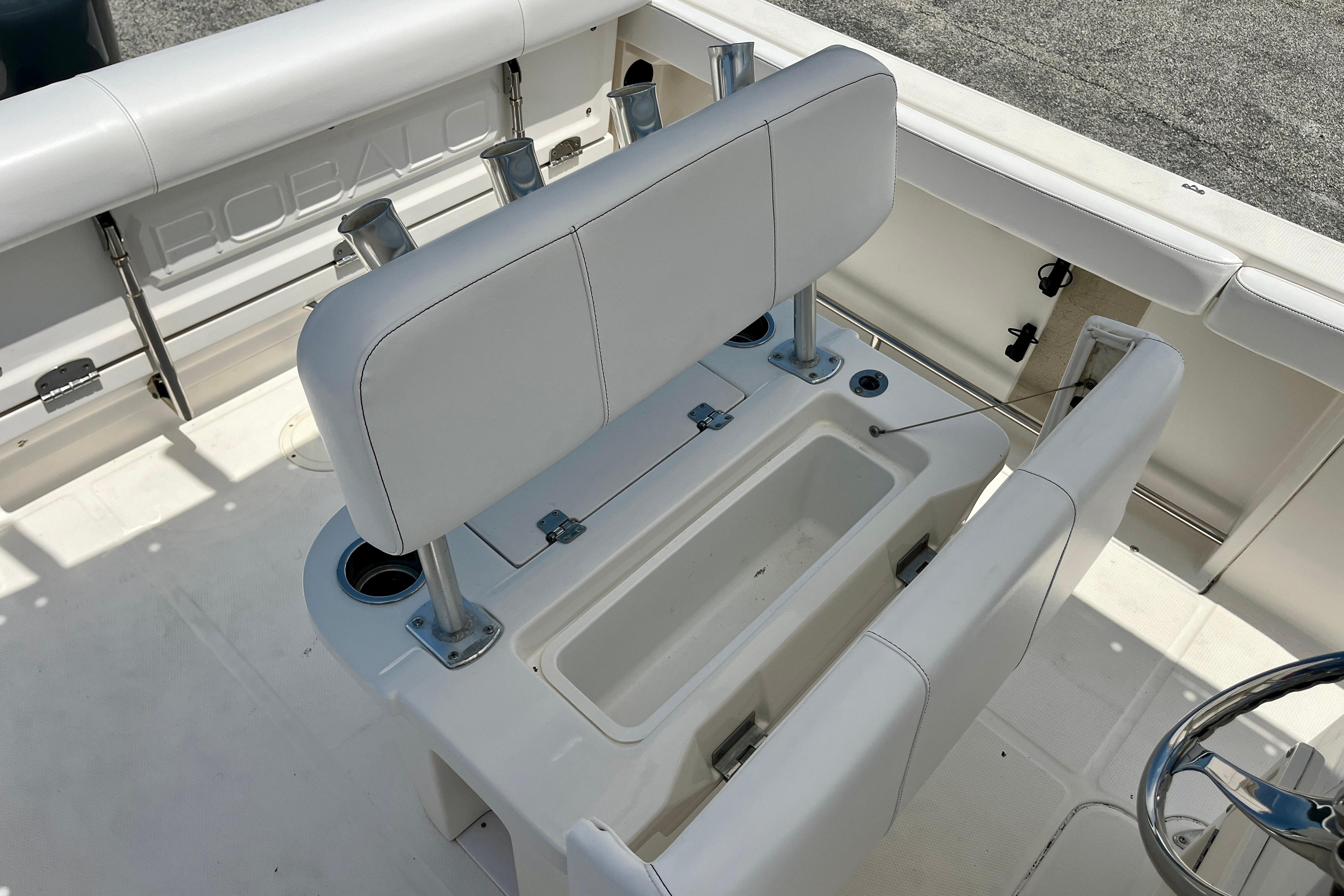 2016 Robalo R222 Center Console boat interior with seating and storage compartments.