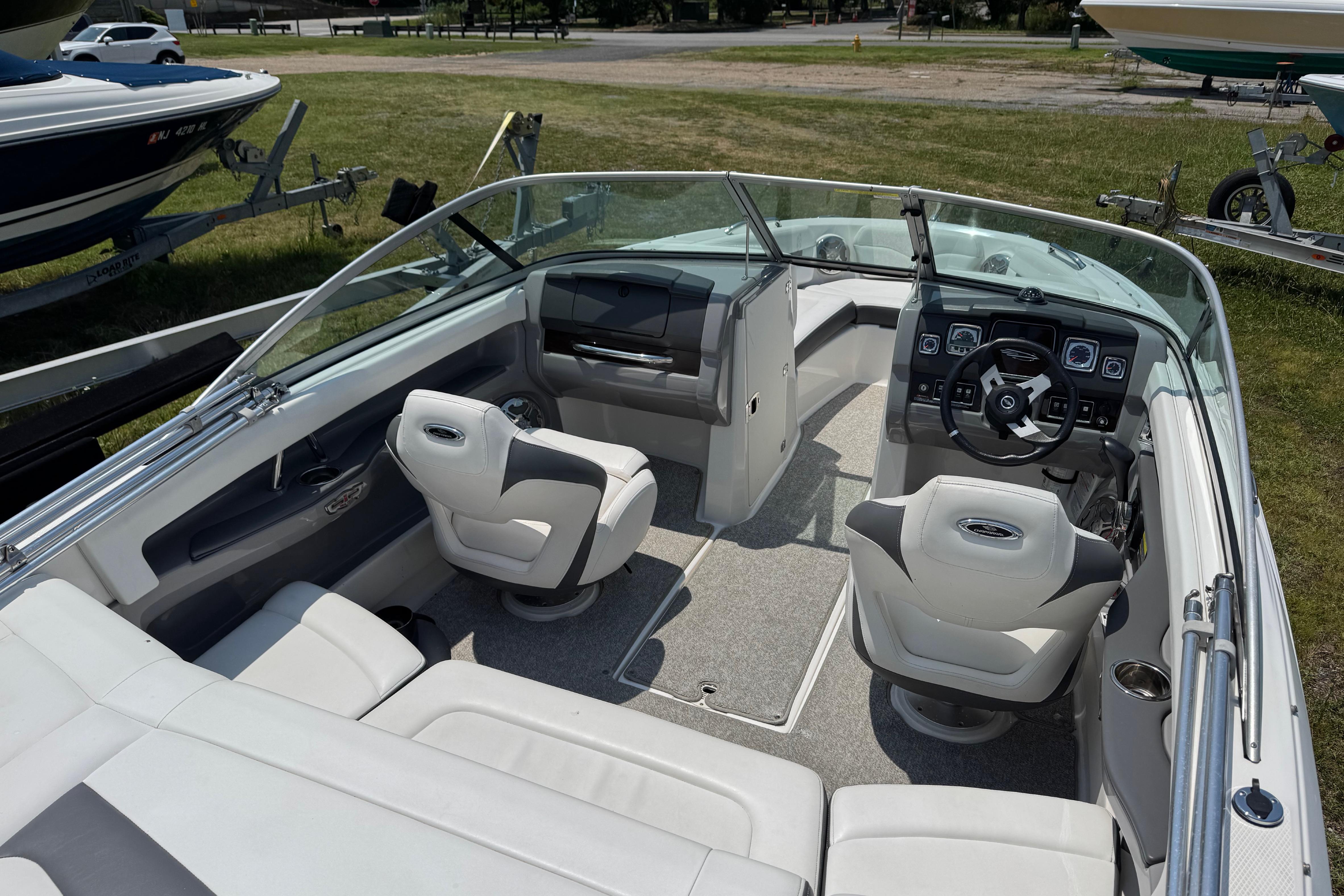 2013 Chaparral 196 SSi boat interior with modern dashboard and comfortable seating.