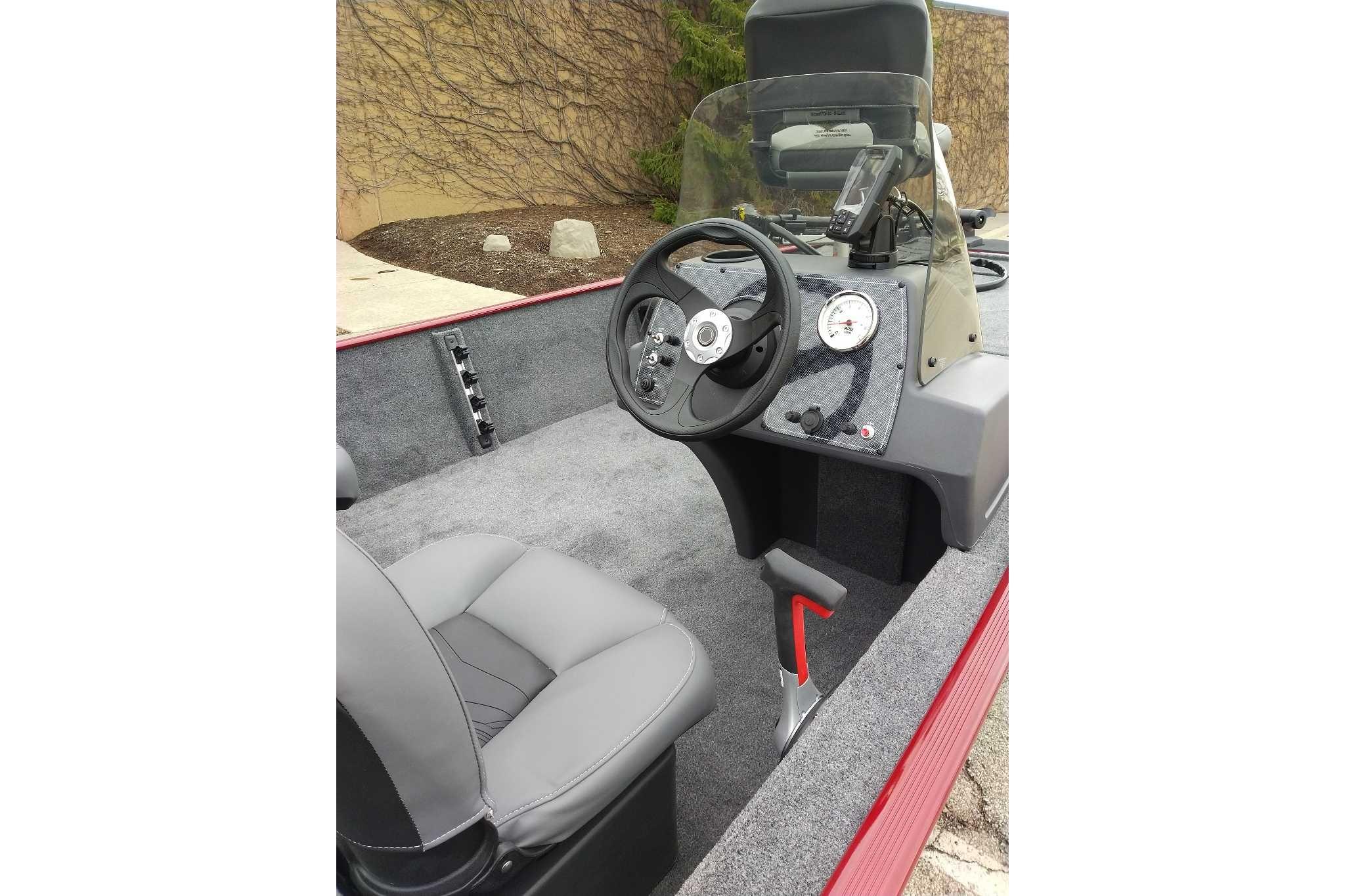 2026 Tracker Bass Tracker Classic XL boat interior with steering wheel and dashboard.