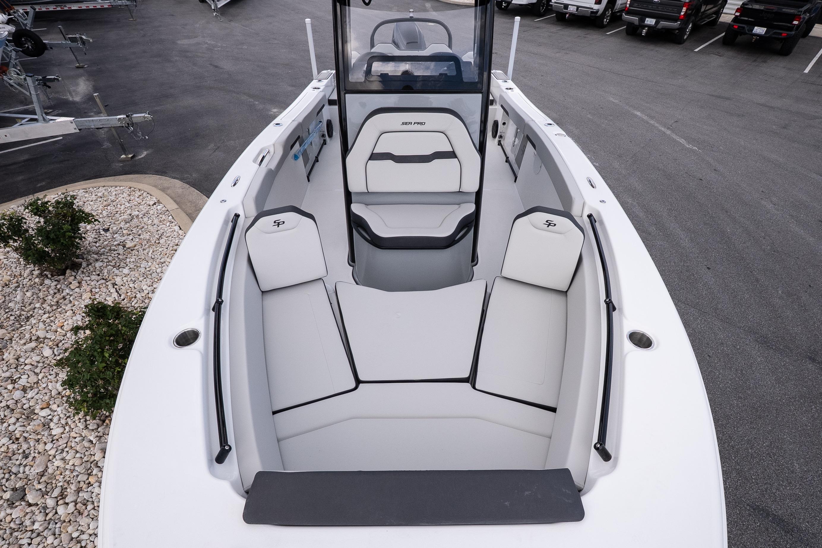 2026 Sea Pro 245FLXR Sandbar boat interior with cushioned seating and sleek design.