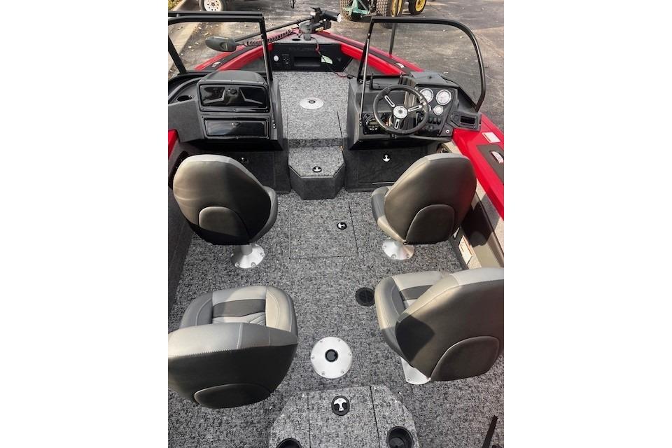 2026 Tracker Targa V-18 WT boat interior with four seats and steering console.