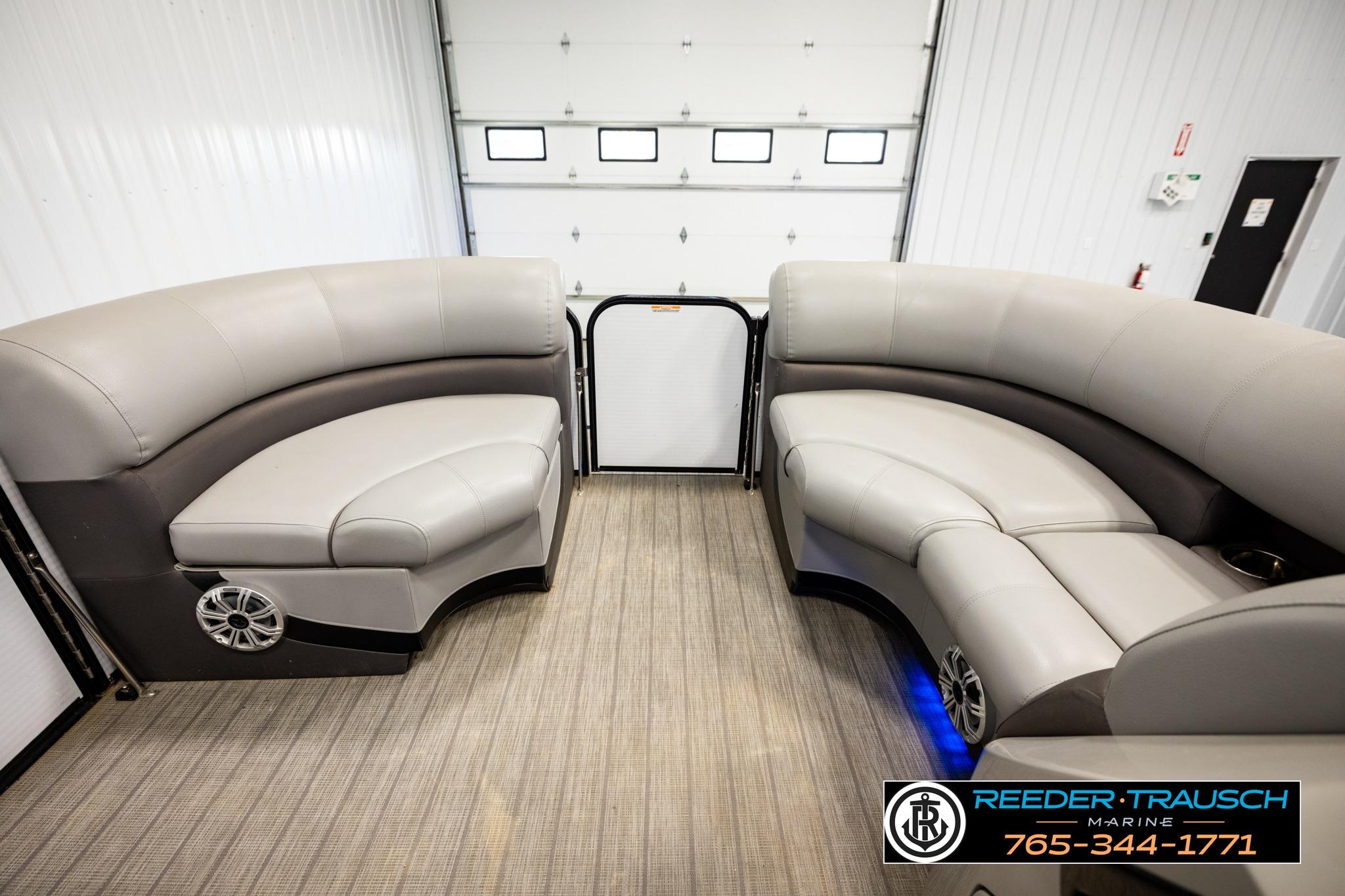 2019 Manitou Oasis SR VP pontoon boat interior with plush seating and modern design.