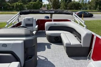 2026 Sun Tracker Party Barge 18 DLX pontoon boat with spacious seating and modern design.