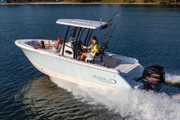 Manufacturer Provided Image: 2020 Robalo R230 Center Console boat cruising on a lake with passengers.