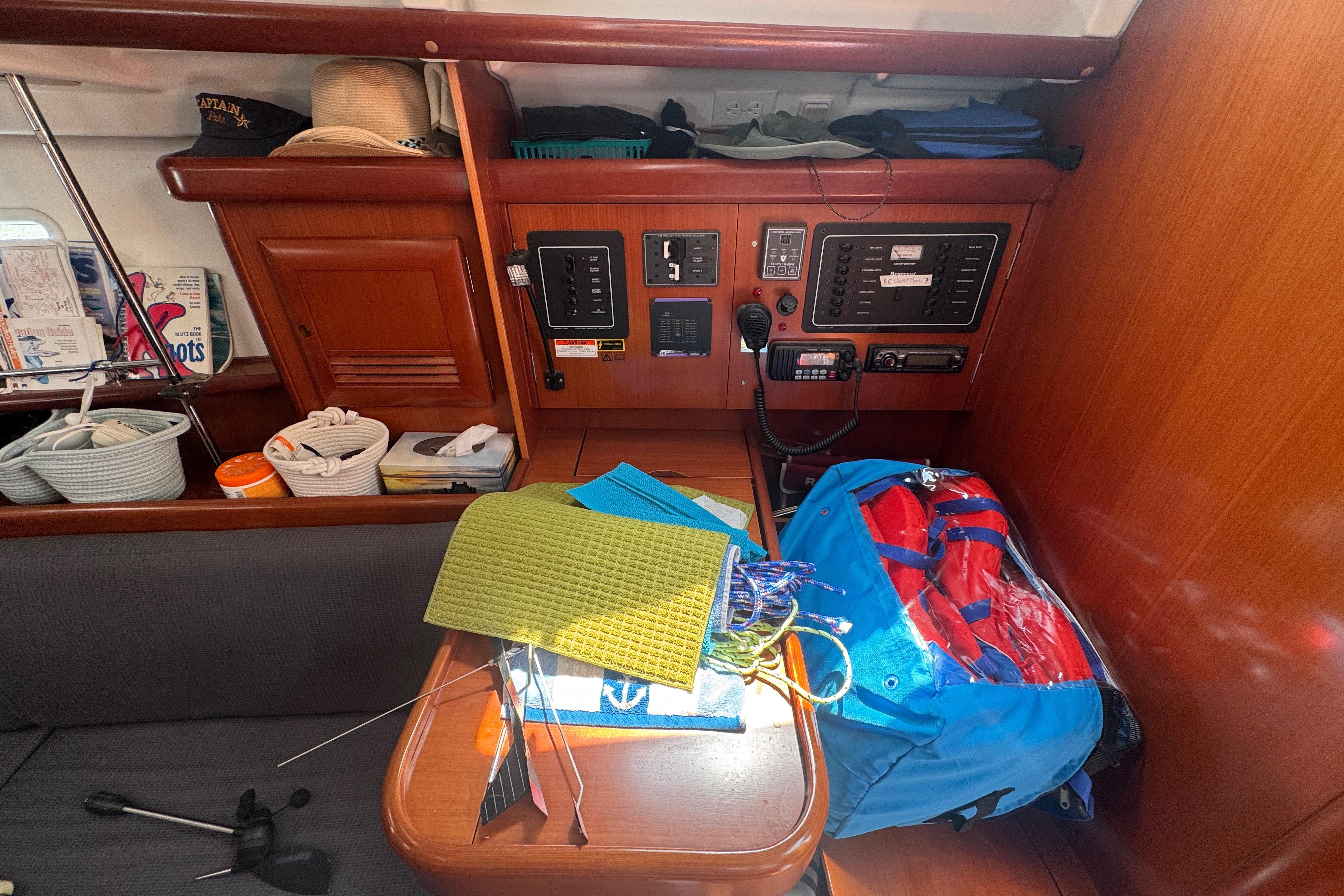Interior of 2007 Beneteau Oceanis Clipper 373 sailboat with navigation equipment and storage.