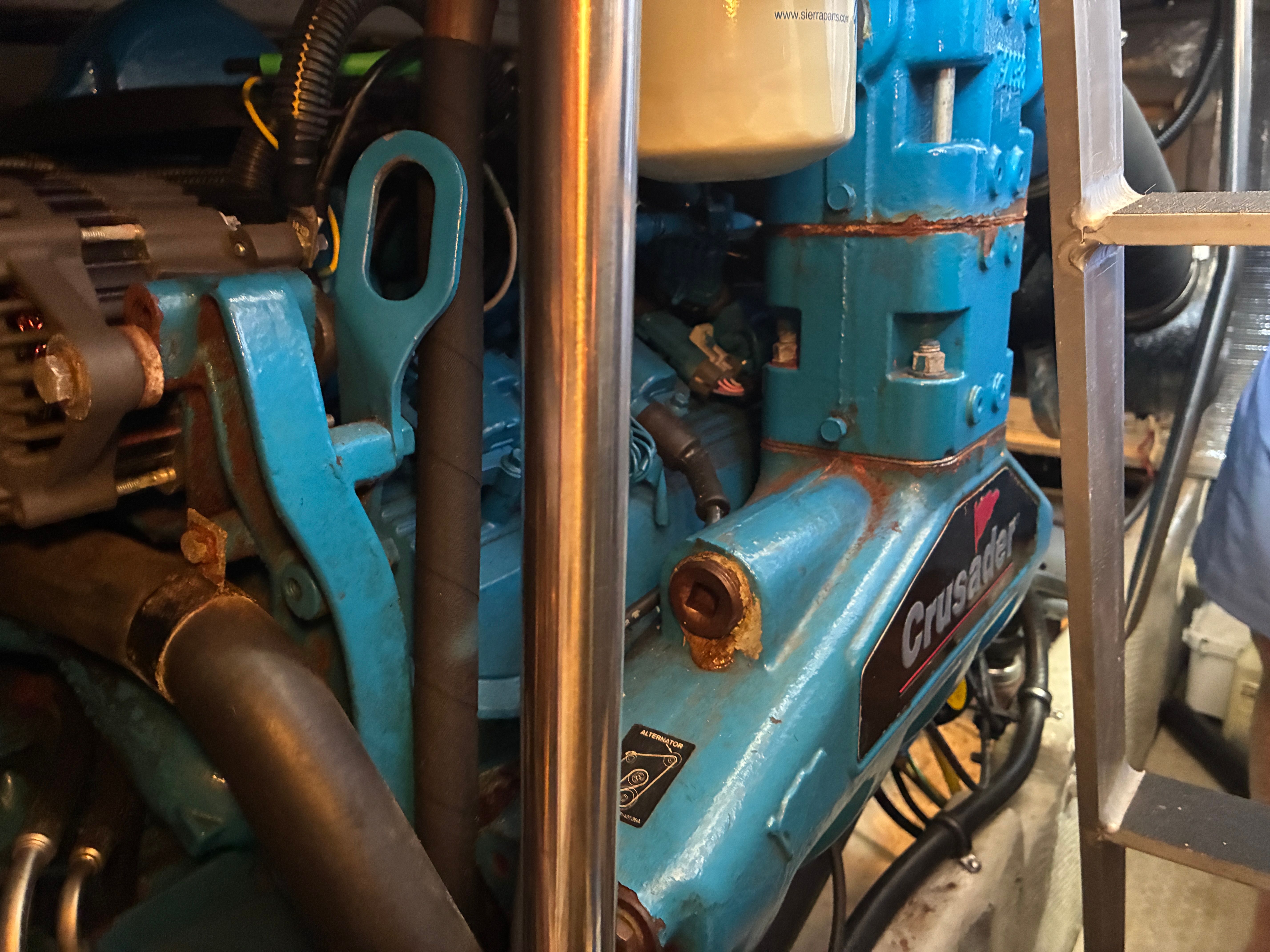 Close-up of a blue Crusader engine in a 2001 Silverton 392 Motor Yacht.