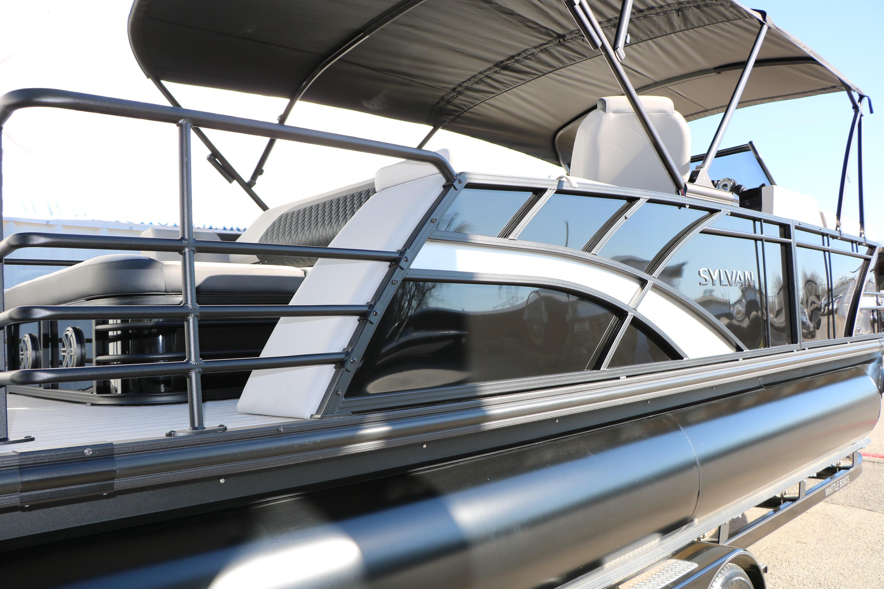 2026 Sylvan L3 CLZ DH pontoon boat with sleek black design and spacious seating.