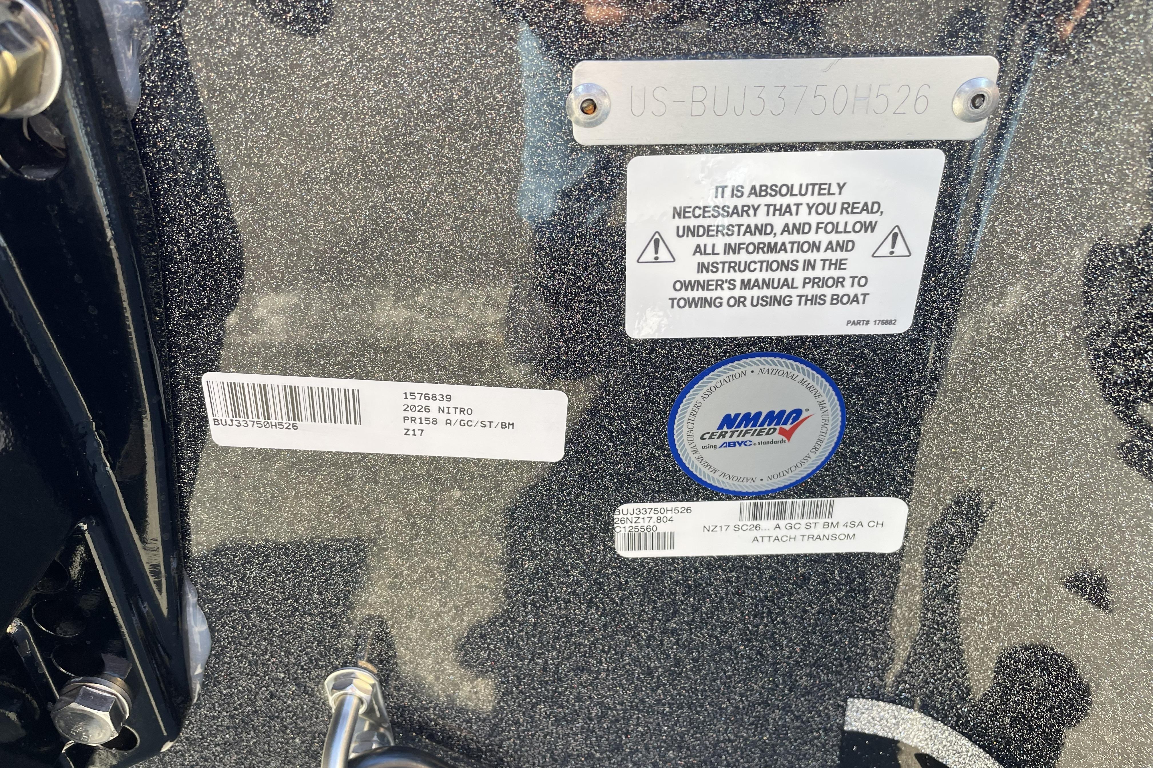 2026 Nitro Z17 boat transom with safety and certification labels.