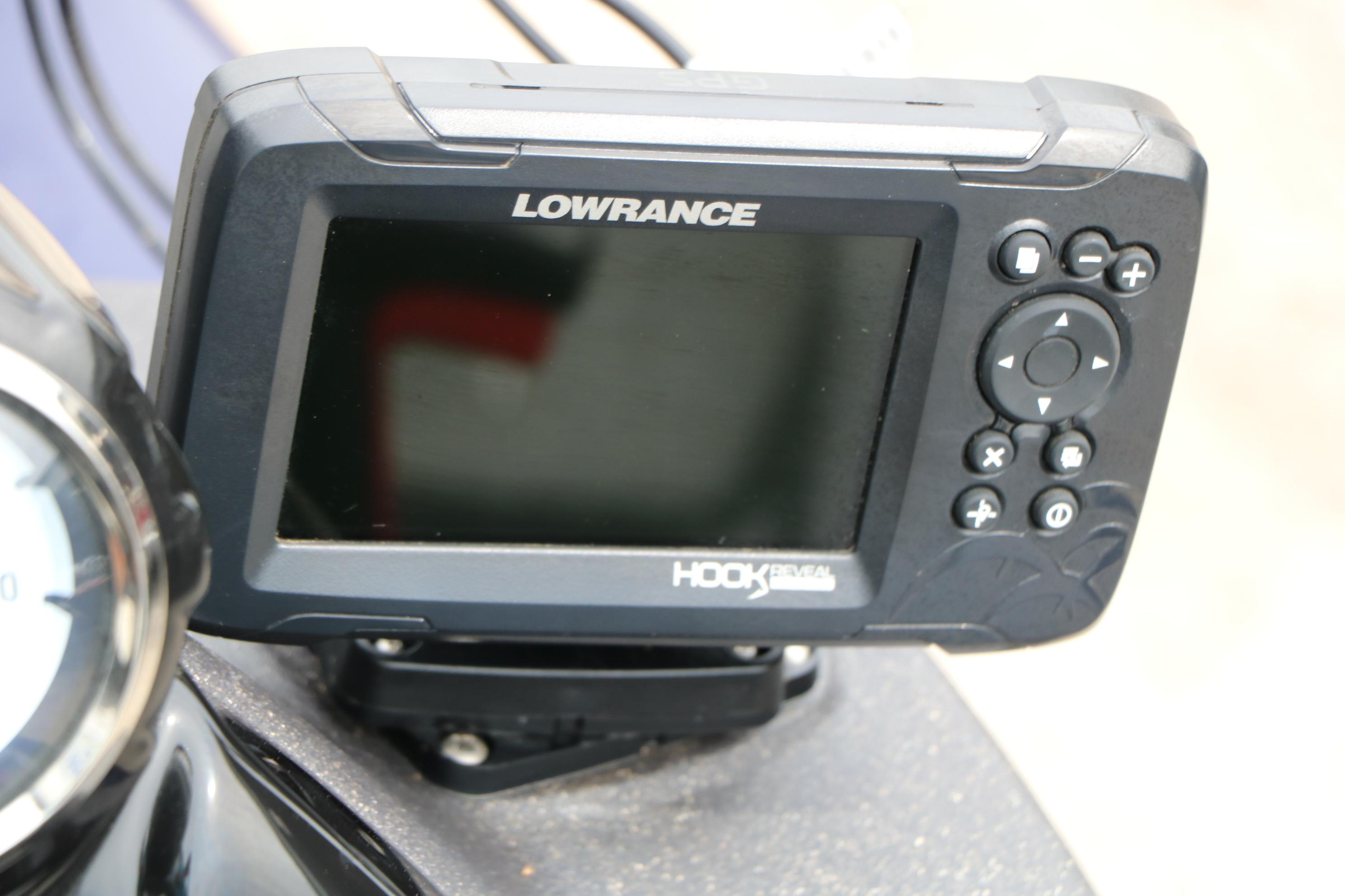 Lowrance Hook Reveal fish finder on 2022 Tracker Pro Team 175 TF boat.