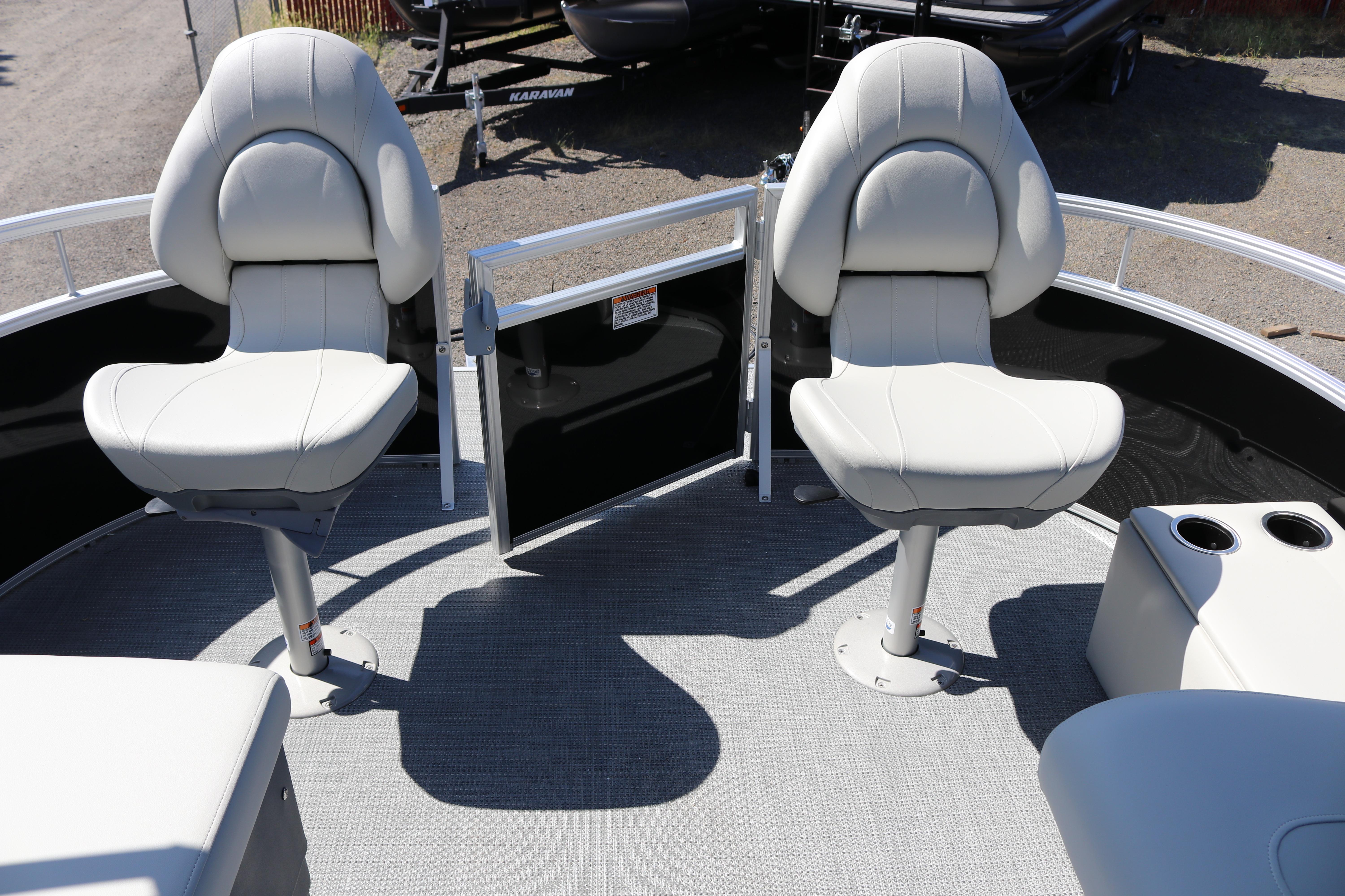 2025 SunChaser Vista 20 Fish boat interior with two swivel seats and cup holders.