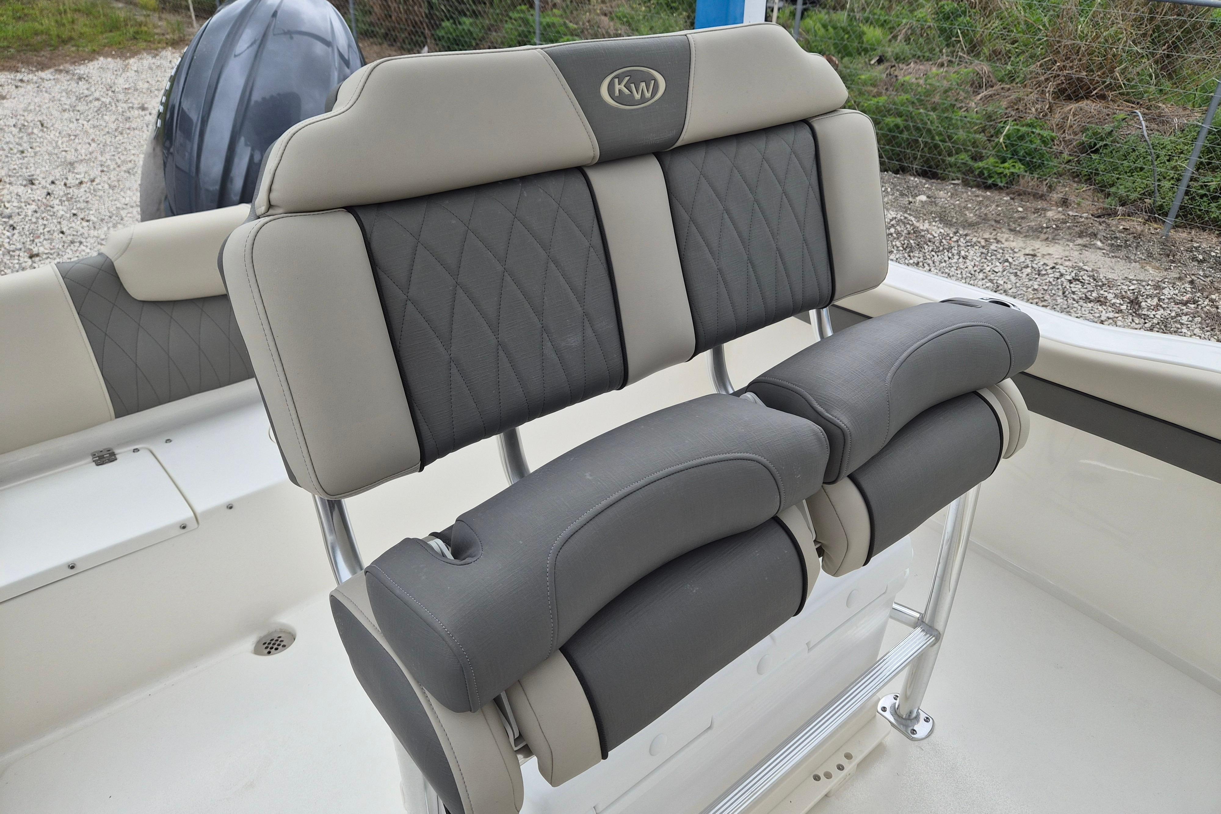 2026 Key West 219 FS boat seating with gray and beige upholstery.