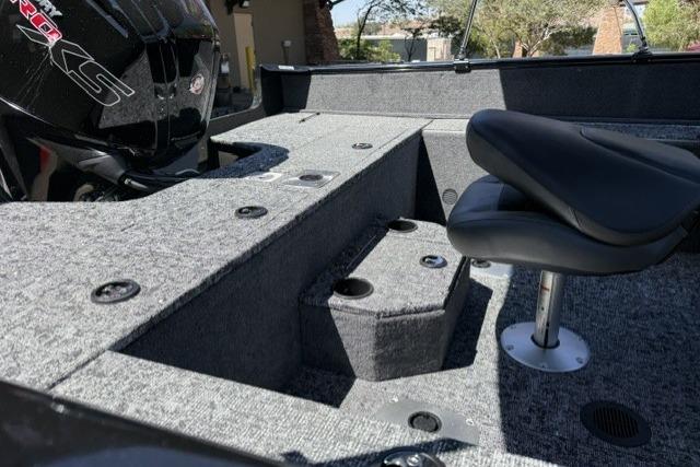 2026 Tracker Pro Guide V-175 WT boat interior with seating and motor detail.