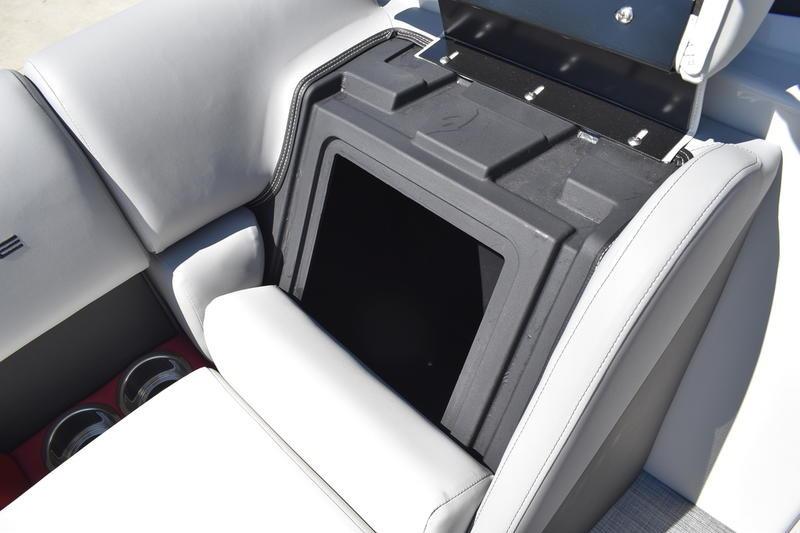 2026 Lowe SS 210 WT boat seat storage compartment with open lid.