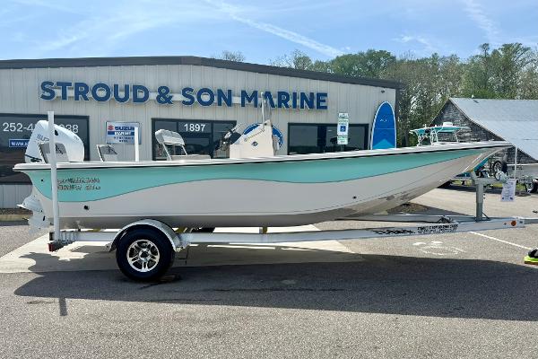 2025 Carolina Skiff 21 LS boat on trailer at Stroud & Son Marine dealership.
