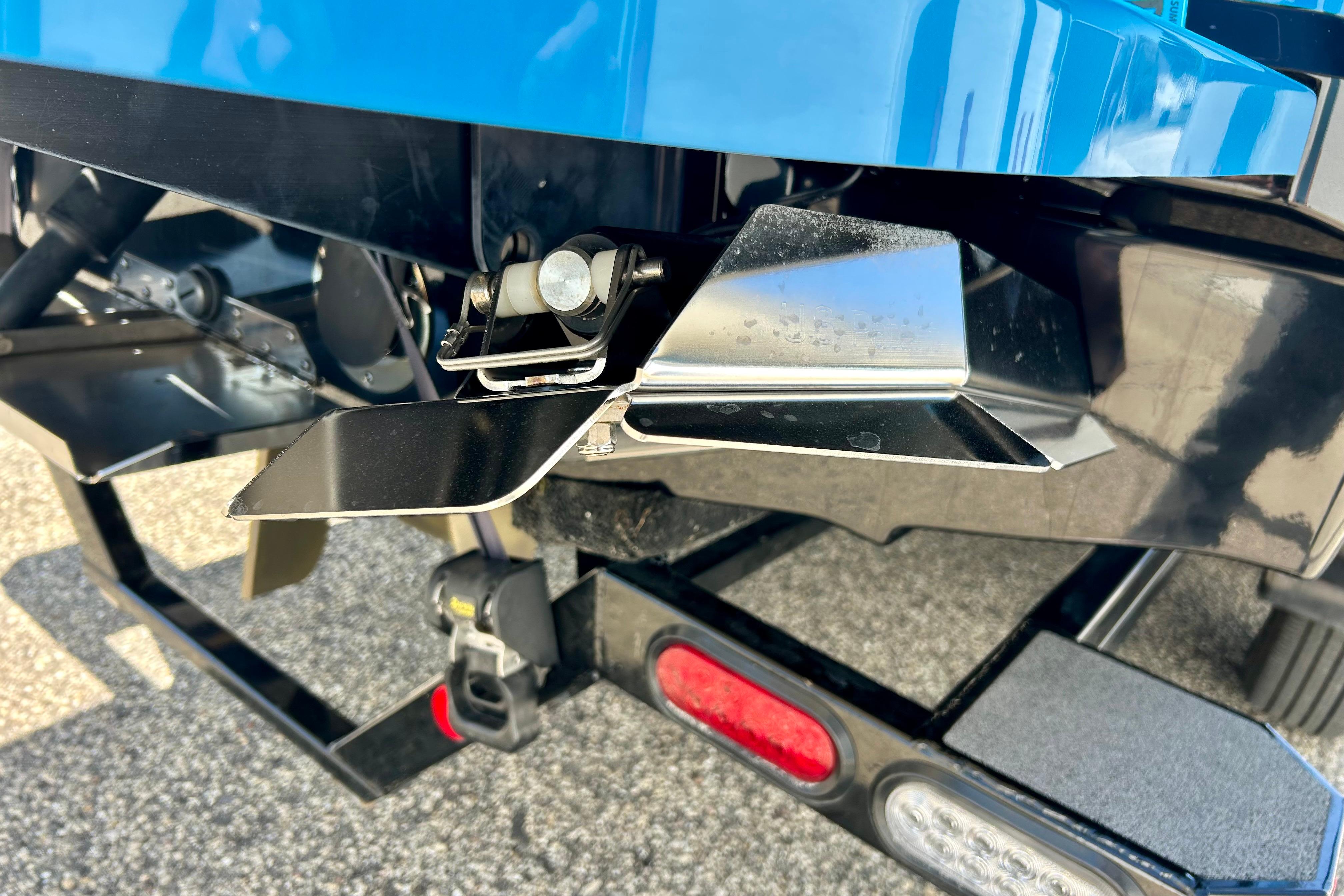 Rear view of a 2021 MasterCraft NXT24 boat trailer with metal components.