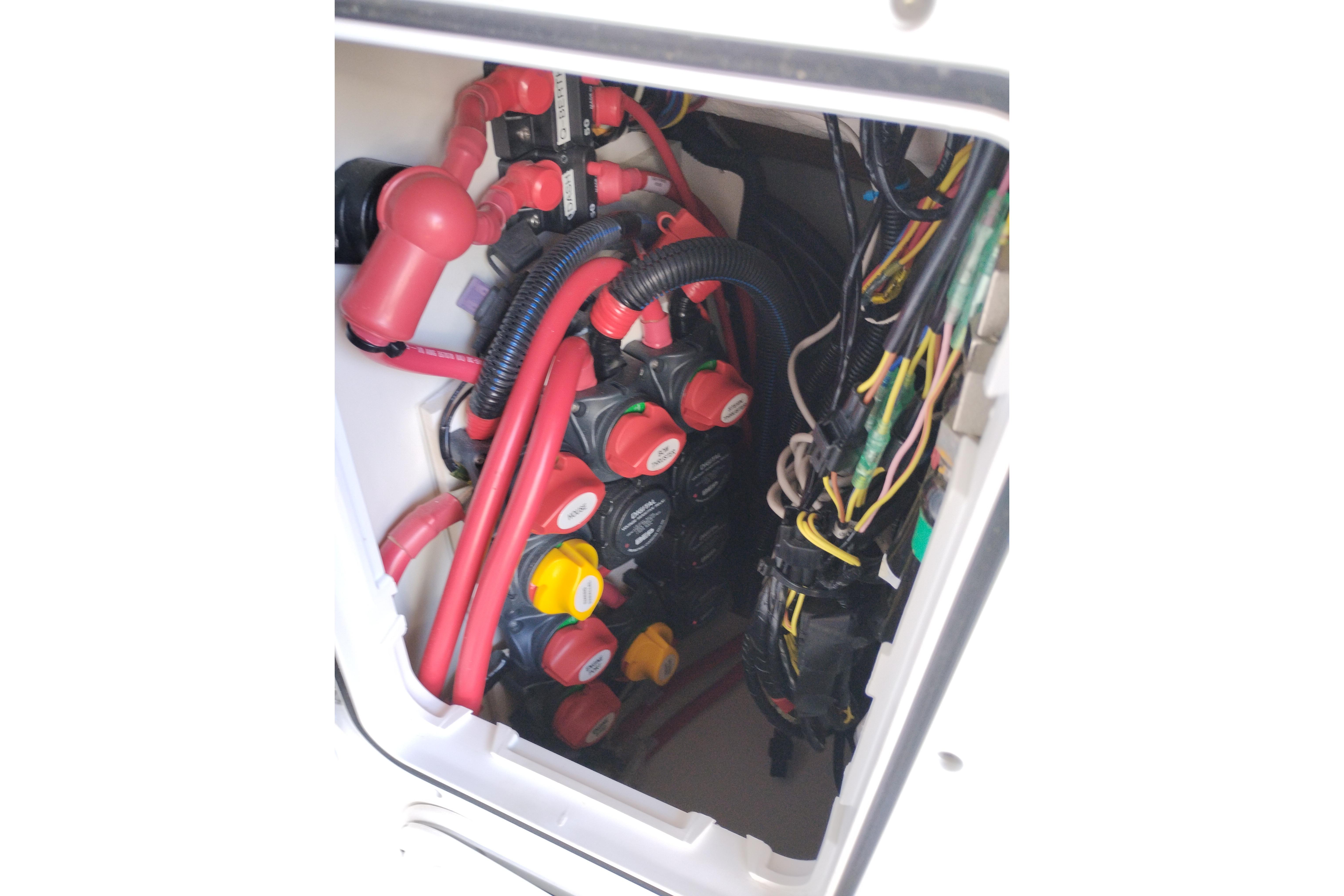 Engine compartment of 2022 Cutwater C-32 Coupe with wiring and components visible.