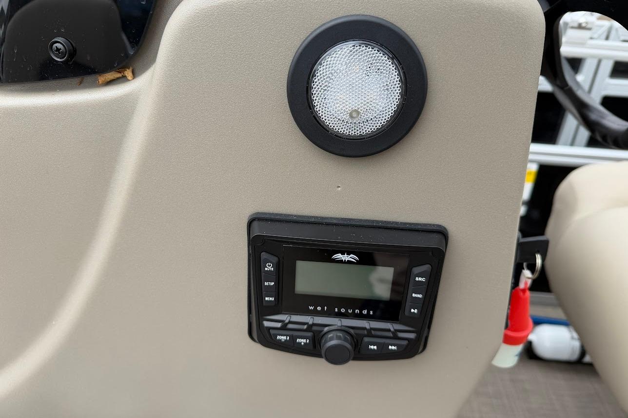 Control panel of 2025 Sun Tracker Party Barge 16 DLX with audio system.