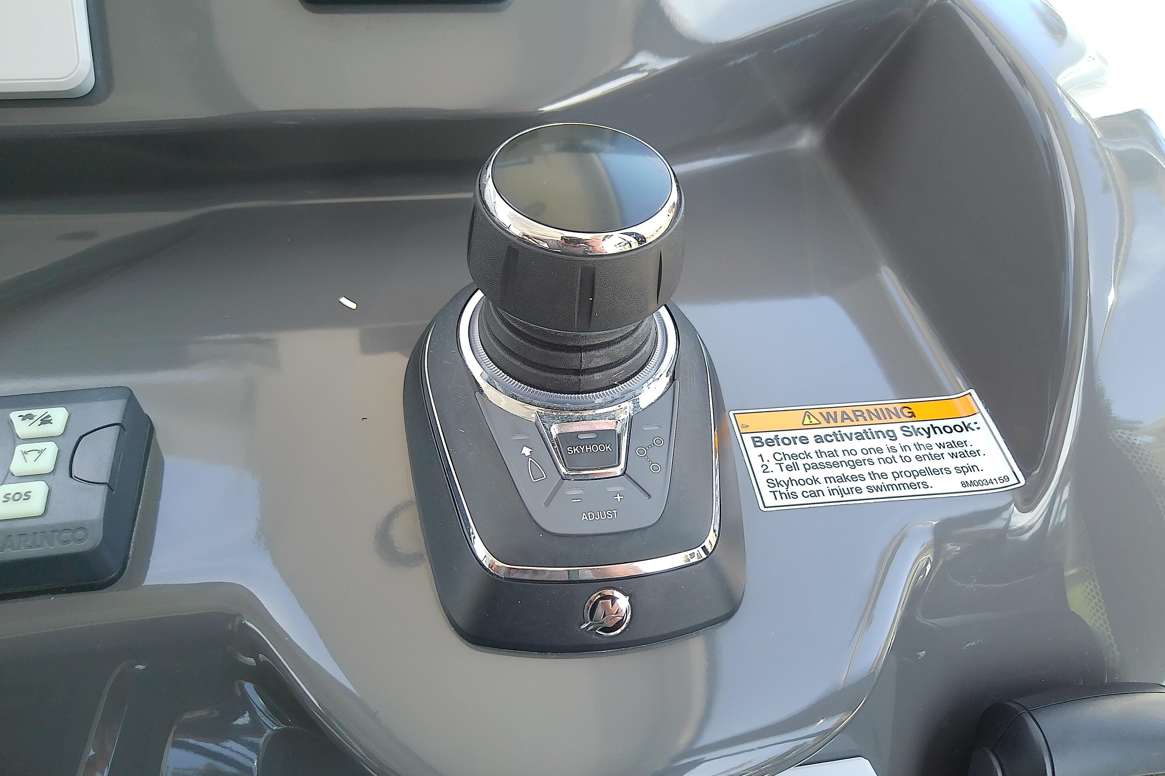 Joystick control panel on 2024 Beneteau Gran Turismo 36 yacht dashboard.
