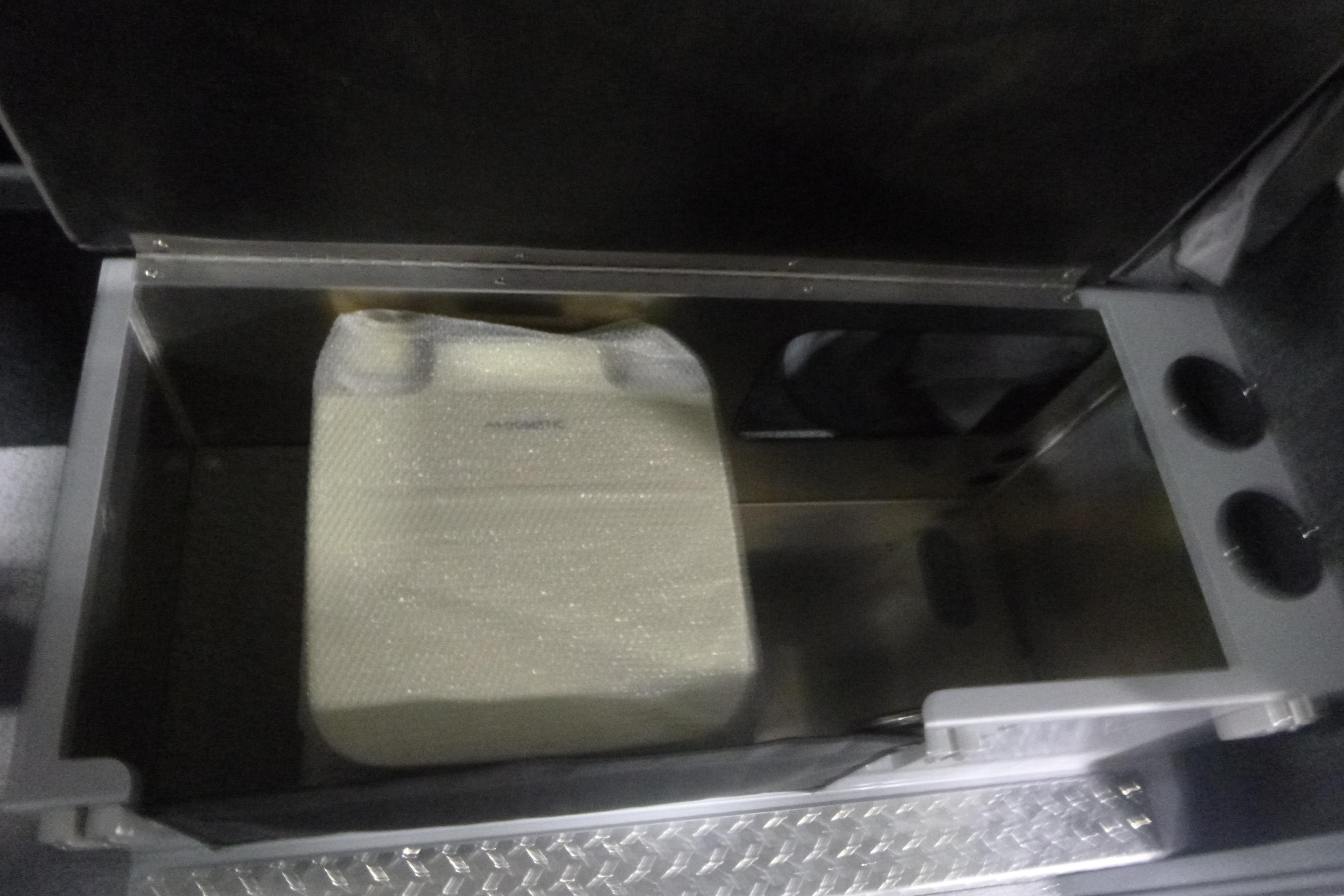 Storage compartment in 2026 KingFisher 2425 Escape HT boat, featuring a secure interior space.