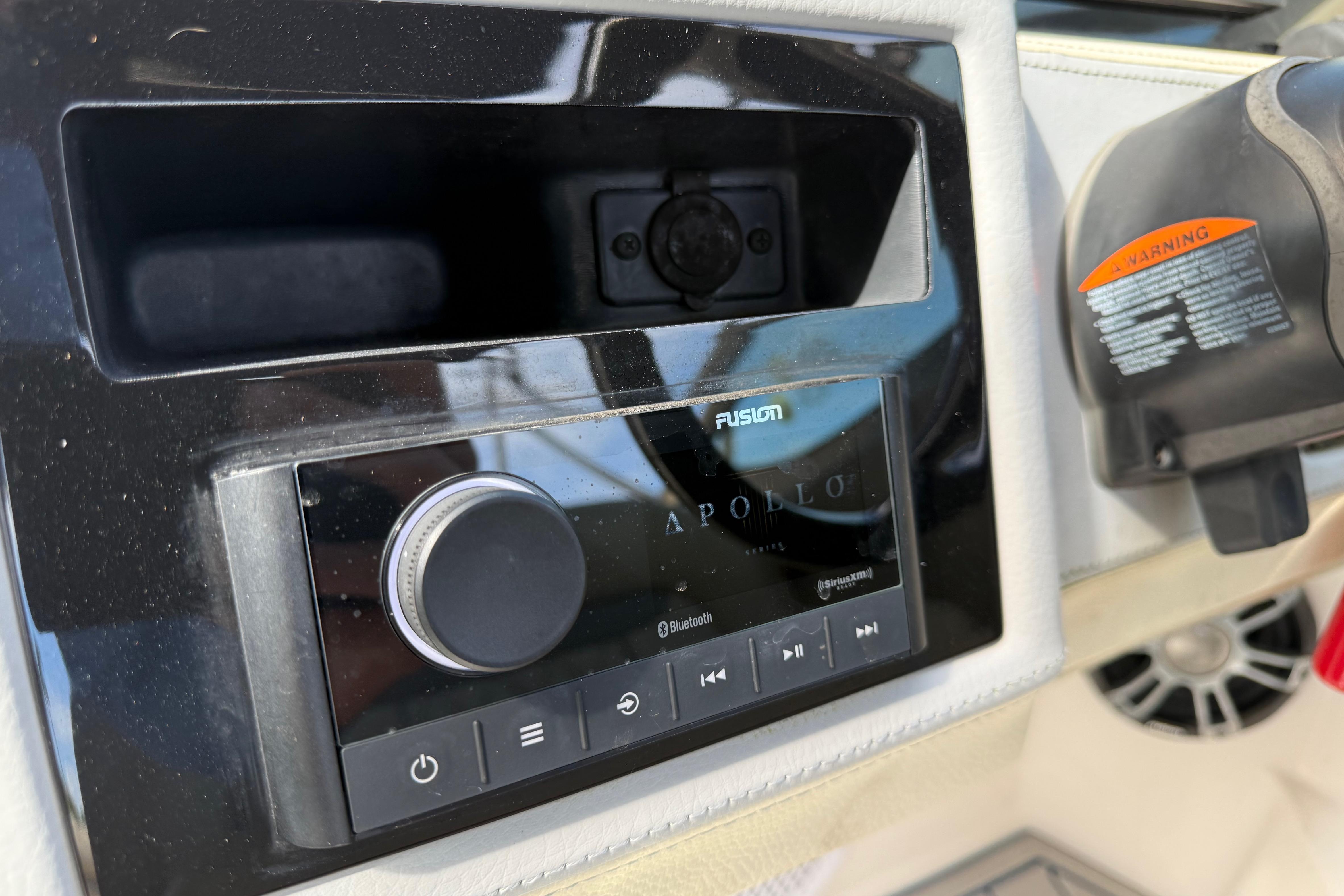 Fusion Apollo audio system on 2021 Regal 26 OBX boat dashboard.