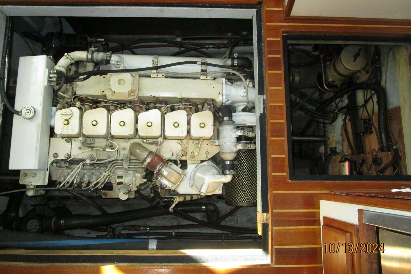 Engine compartment of a 1997 Rosborough Trawler, showcasing detailed mechanical components.