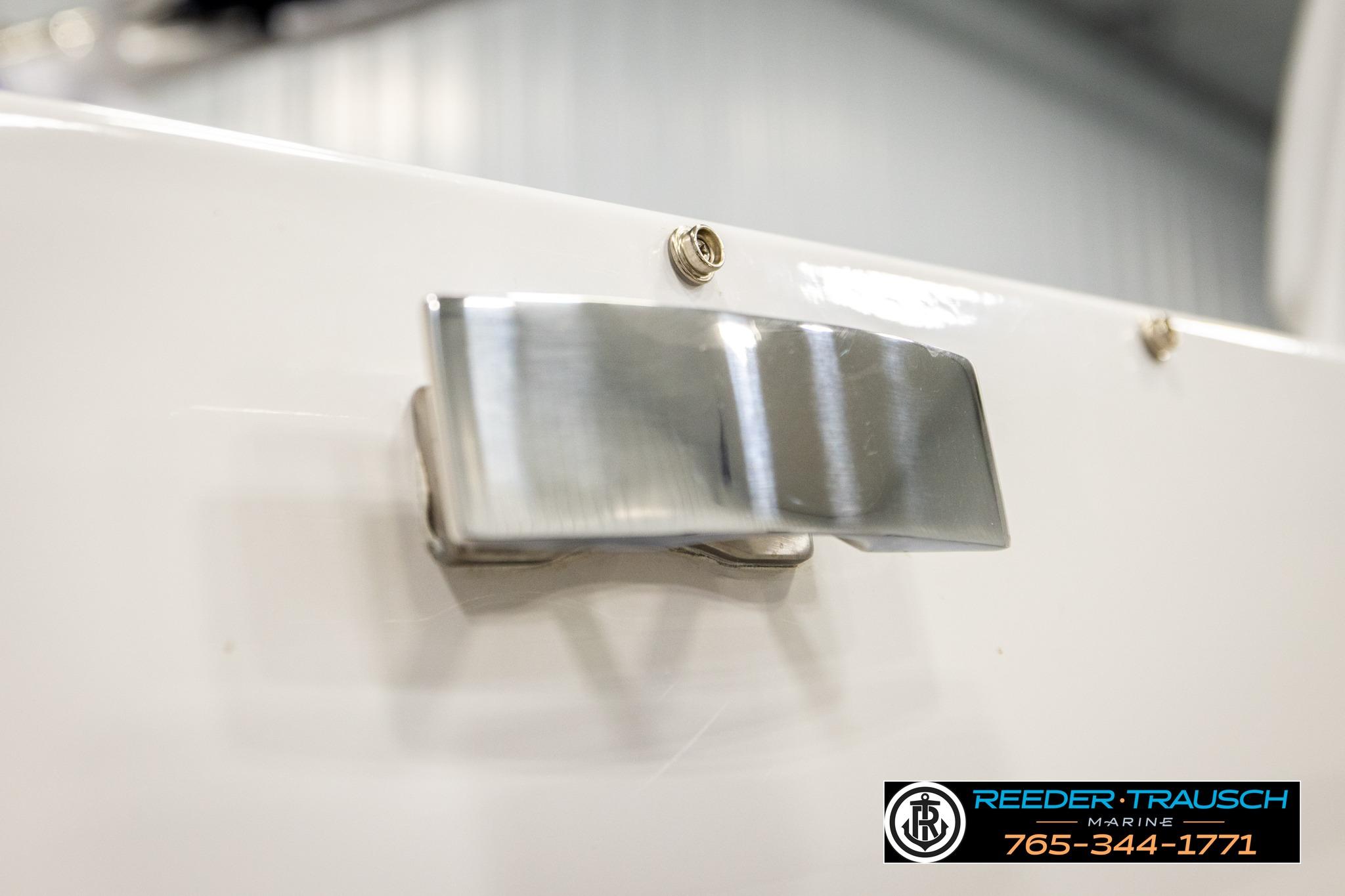 Close-up of 2024 FOURWINNS HD5 Surf boat hardware, featuring sleek metal detailing.