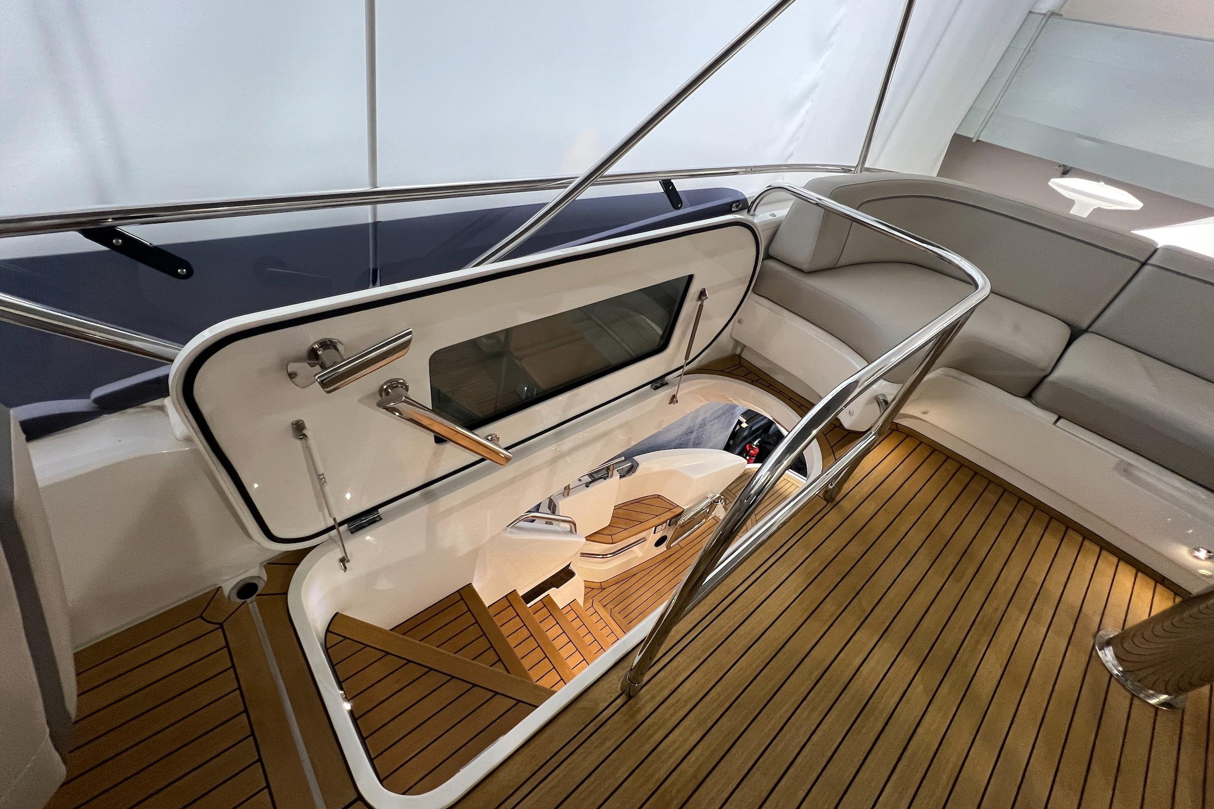 2019 Princess F45 yacht interior with wooden flooring and staircase.