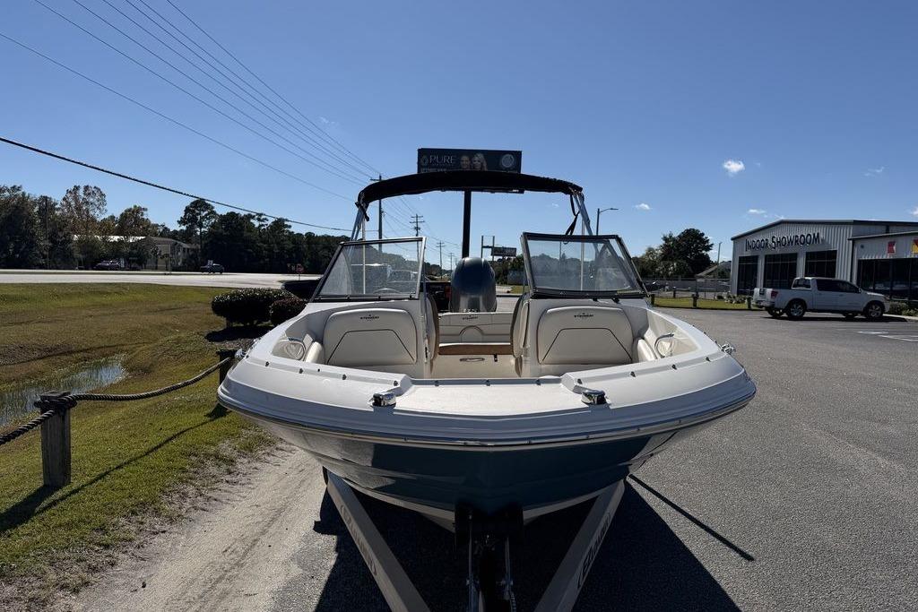 2024 Stingray 191 DC boat displayed outdoors on a sunny day.