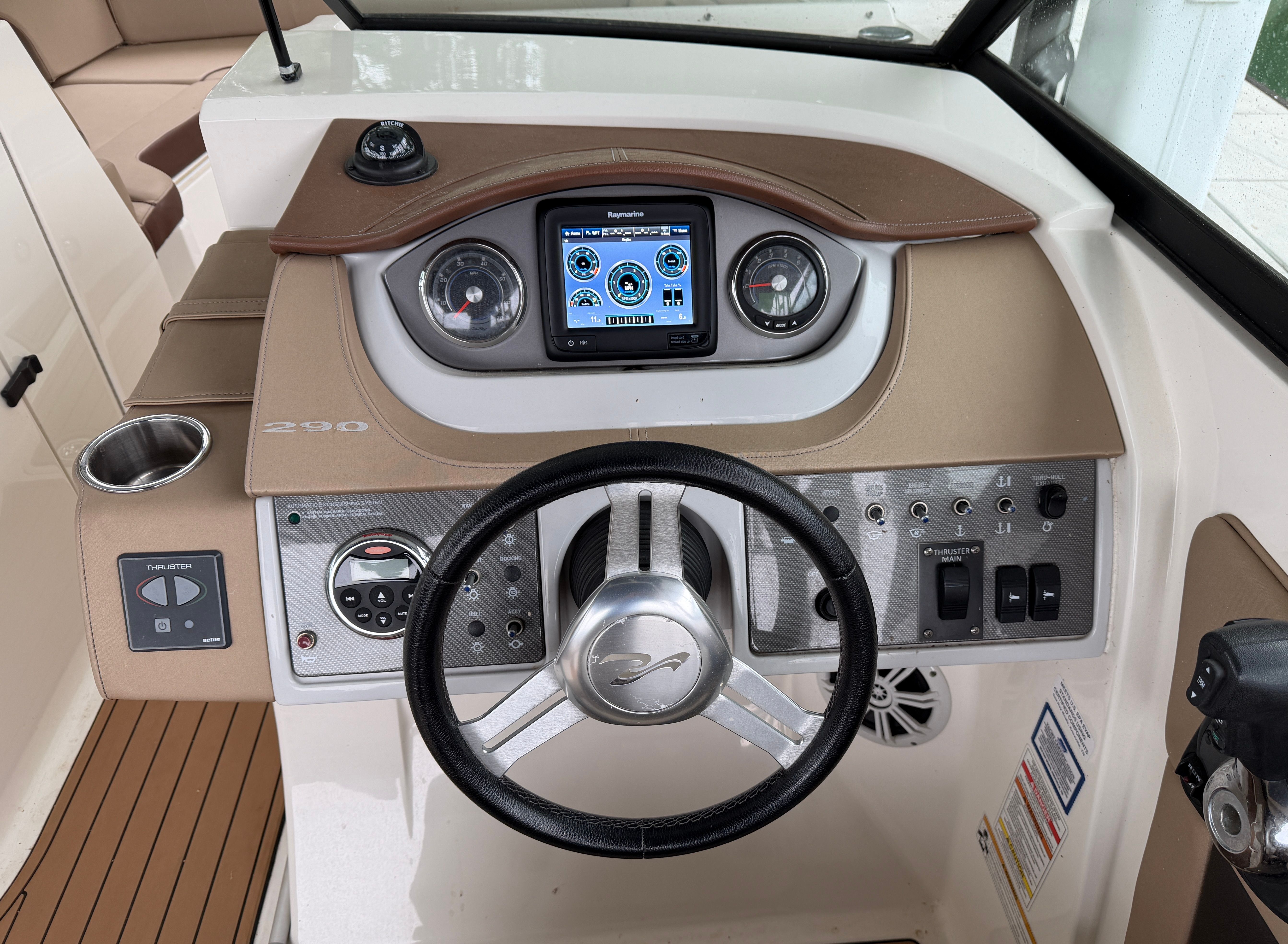 Dashboard of a 2016 Sea Ray 290 Sundeck boat with controls.