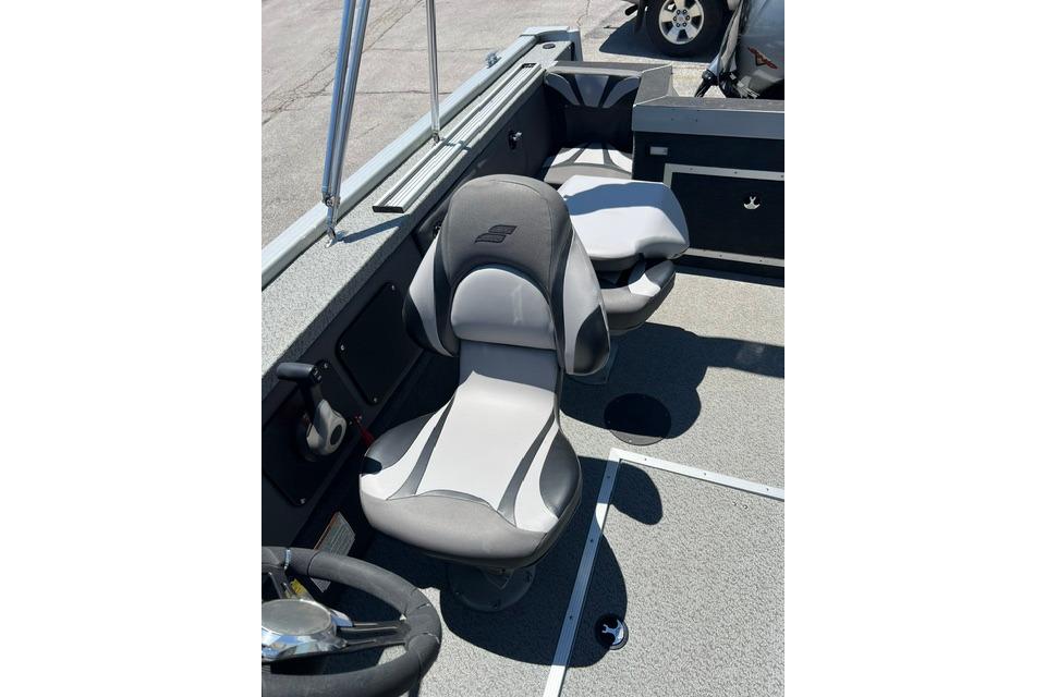 2023 Starweld Fusion 18 DC boat interior with gray seating and steering wheel.