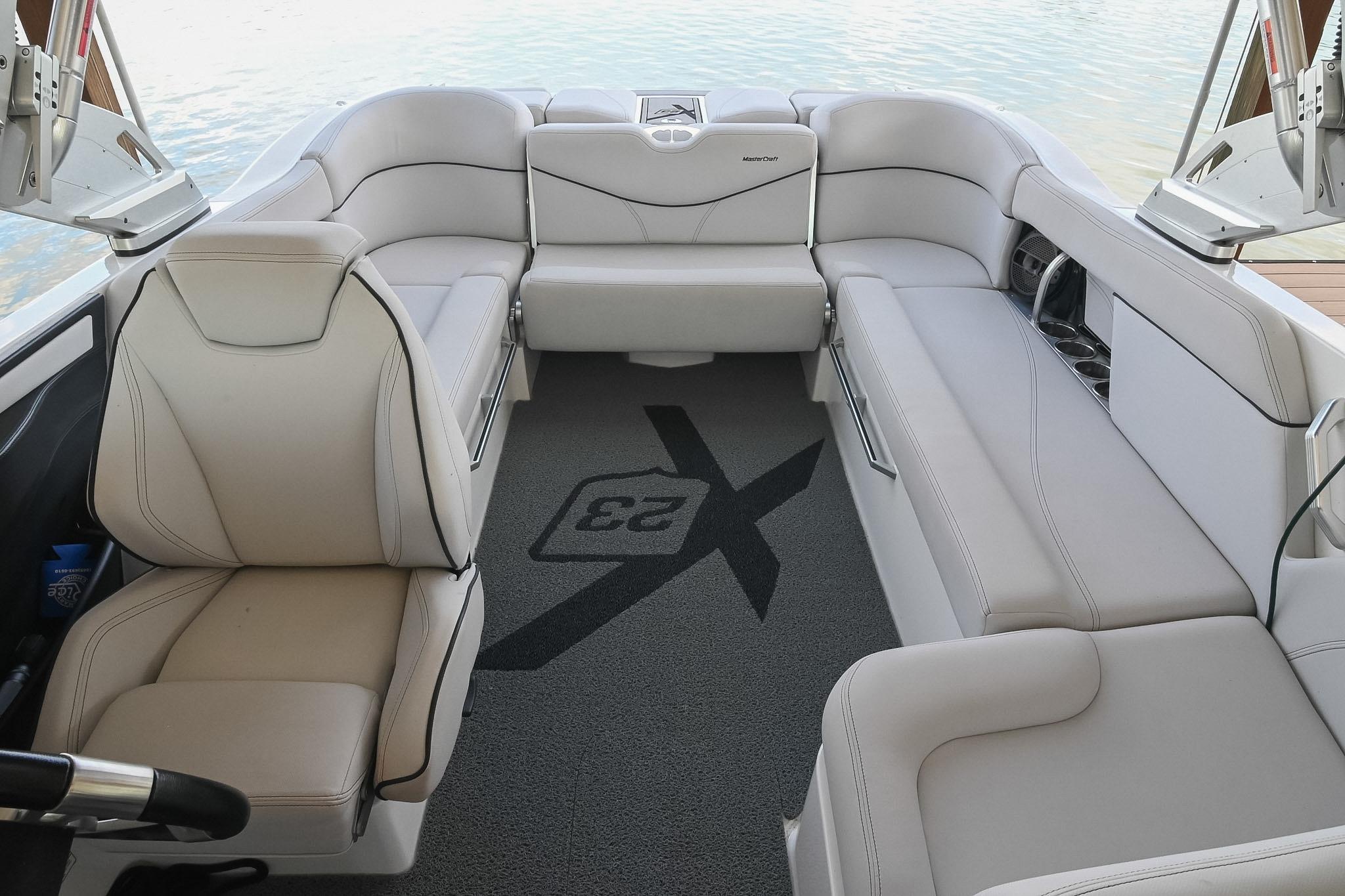 2018 MasterCraft X23 boat interior with luxurious seating and stylish design.