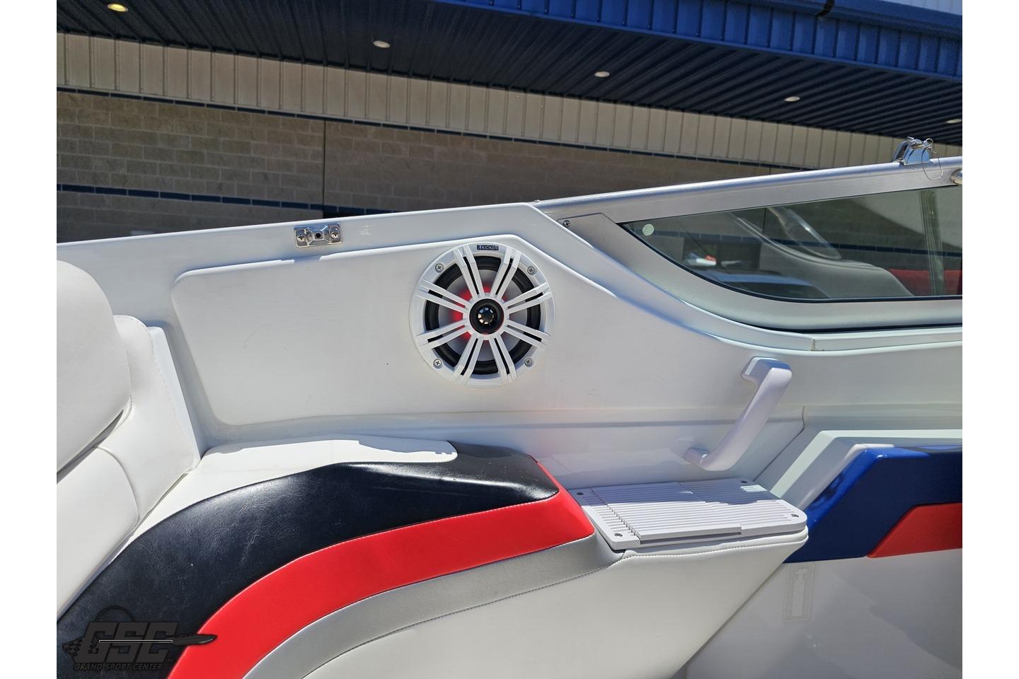Interior of a 2005 Formula 271 FASTech boat with speaker and seating.