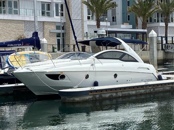 2016 Beneteau GT35 yacht docked at a marina.