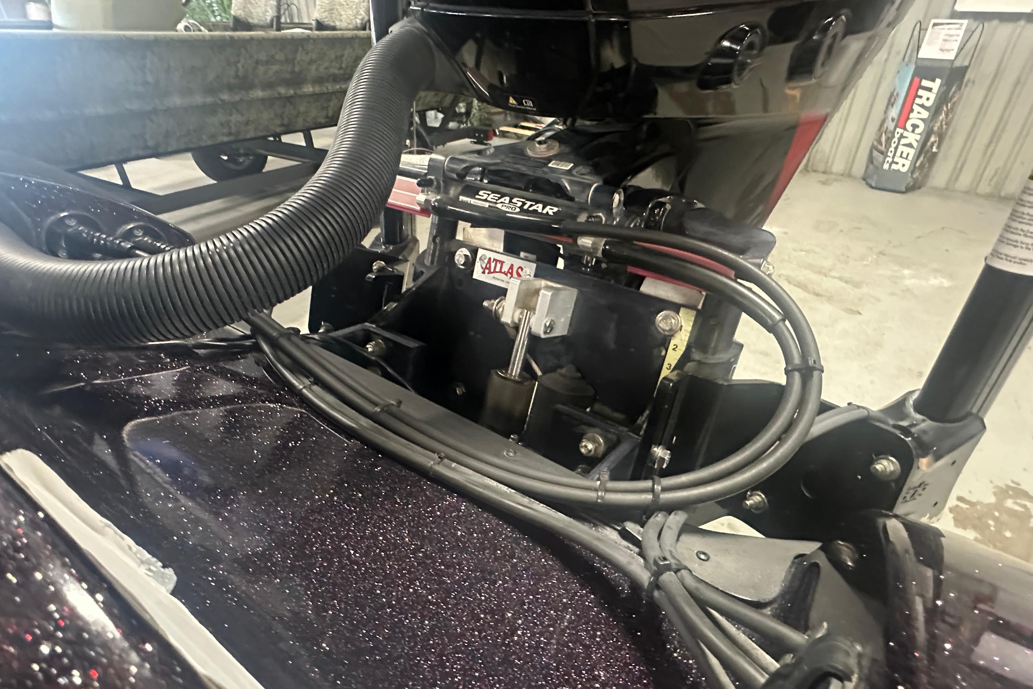 Close-up of a 2022 Nitro Z20 Pro boat engine with visible cables and components.