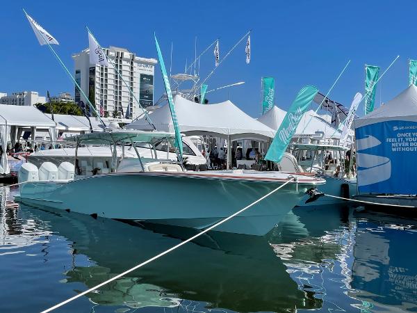 2025 Mag Bay 43 Center Console boat displayed at a marina event.