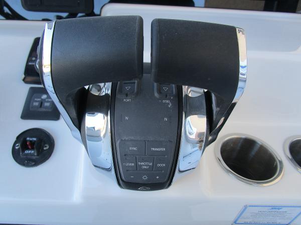 Dual throttle controls on 2025 Sea Pro 292 Offshore boat dashboard.