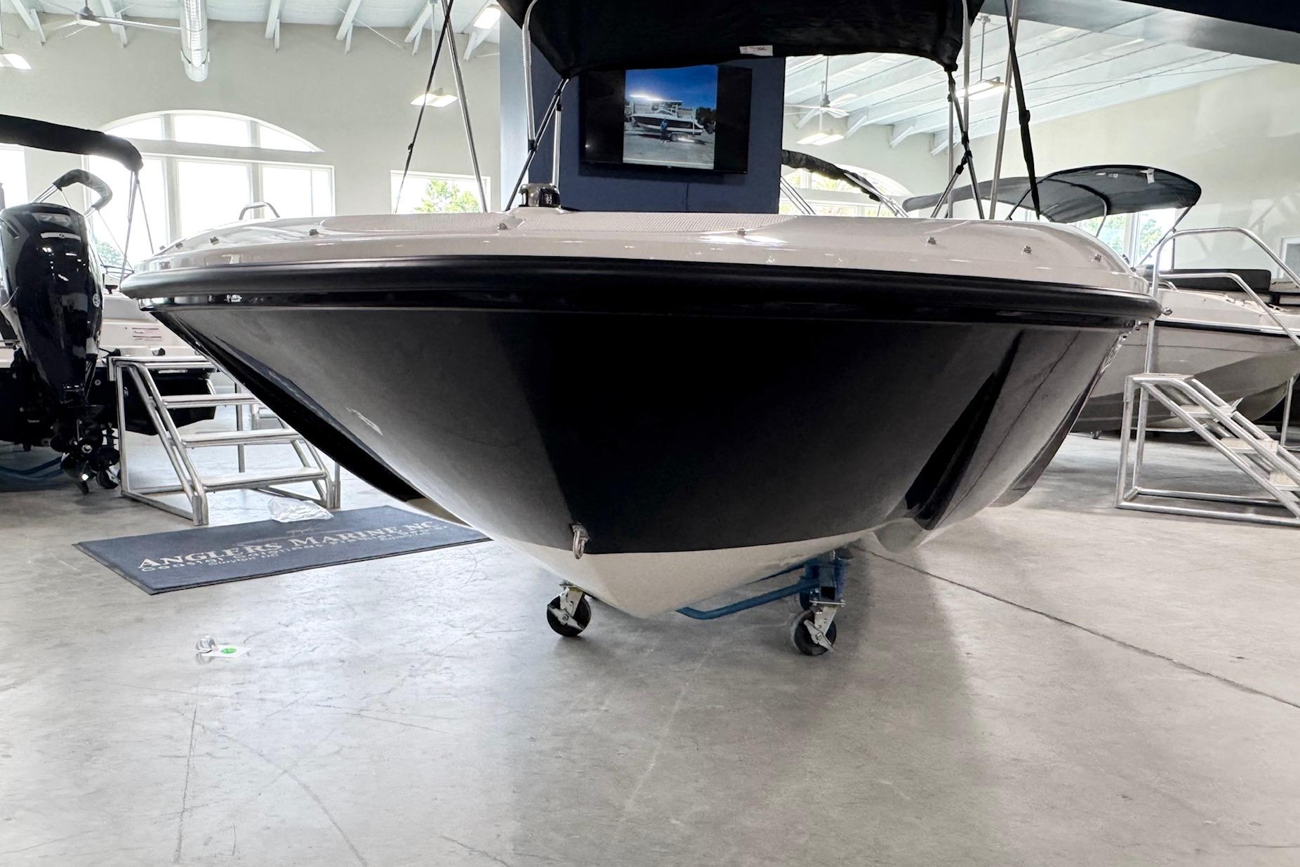 2026 Bayliner Element E18 boat displayed in a showroom, front view.