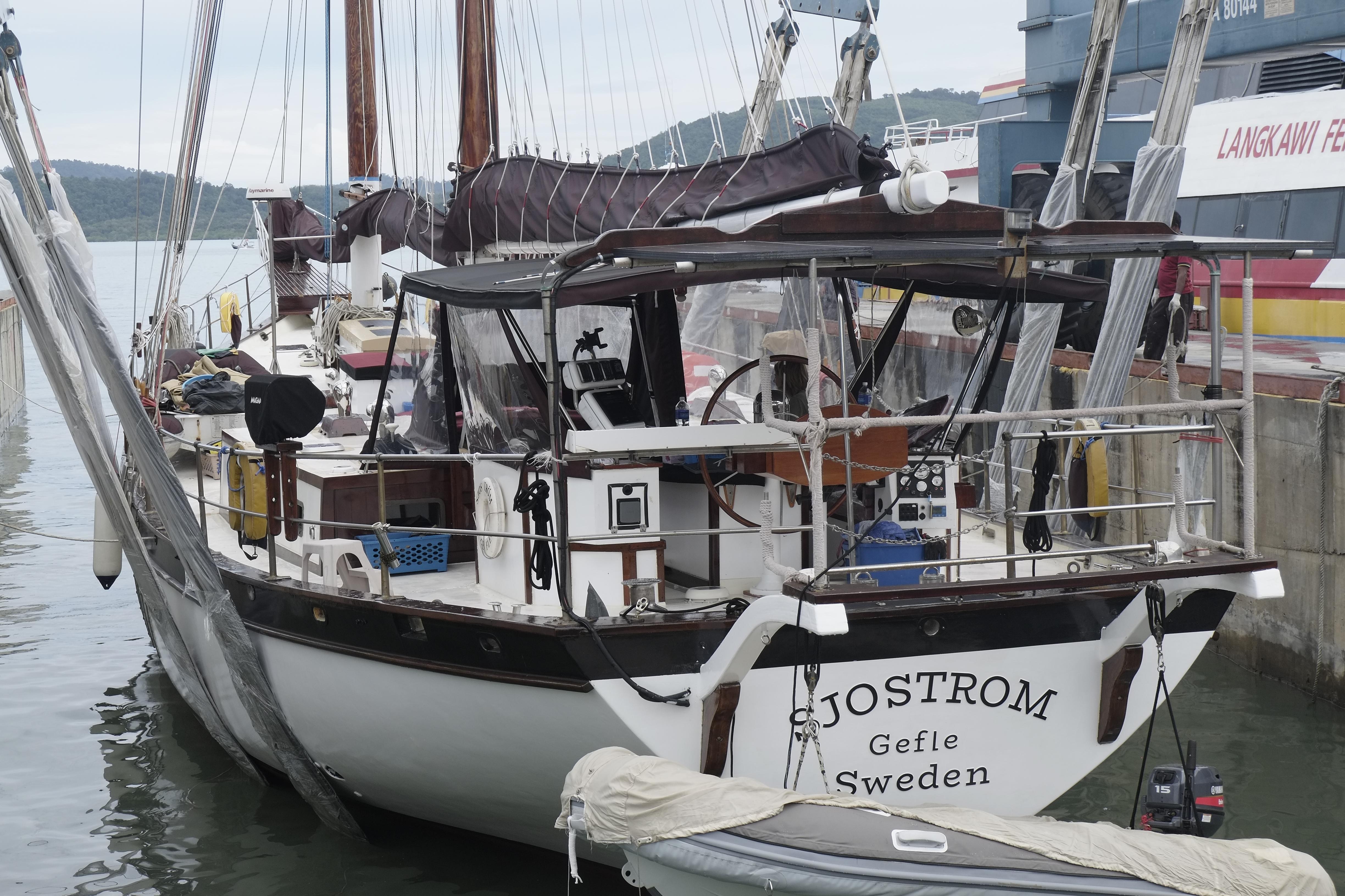 Custom Bud Macintosh schooner, 2006, docked at a harbor with visible rigging and equipment.