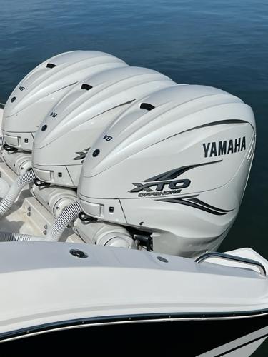 2019 Pursuit S 408 Sport with Yamaha XTO outboard engines on water.
