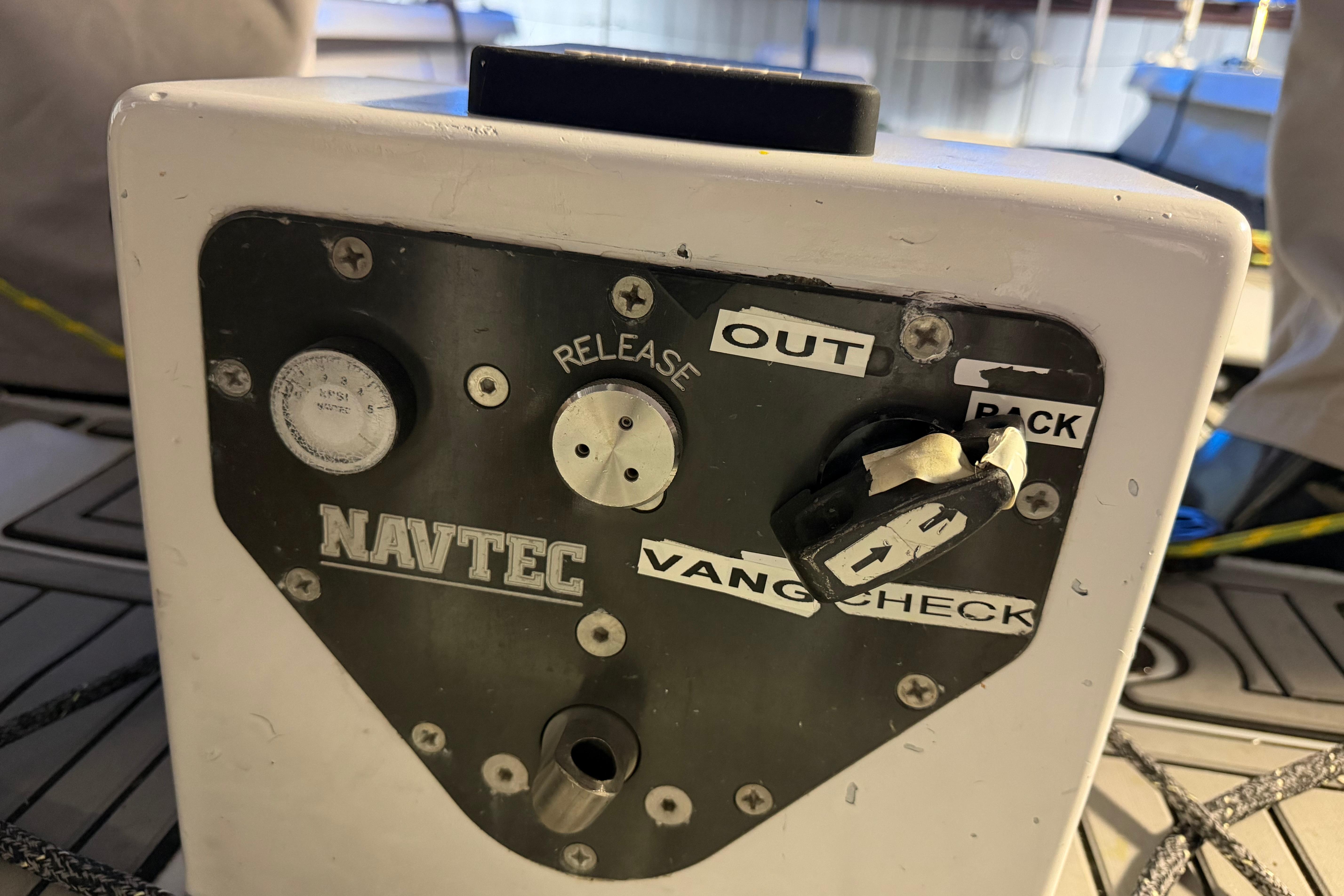 Navtec control panel on Andrews 63 sailboat, featuring vang check and release functions.