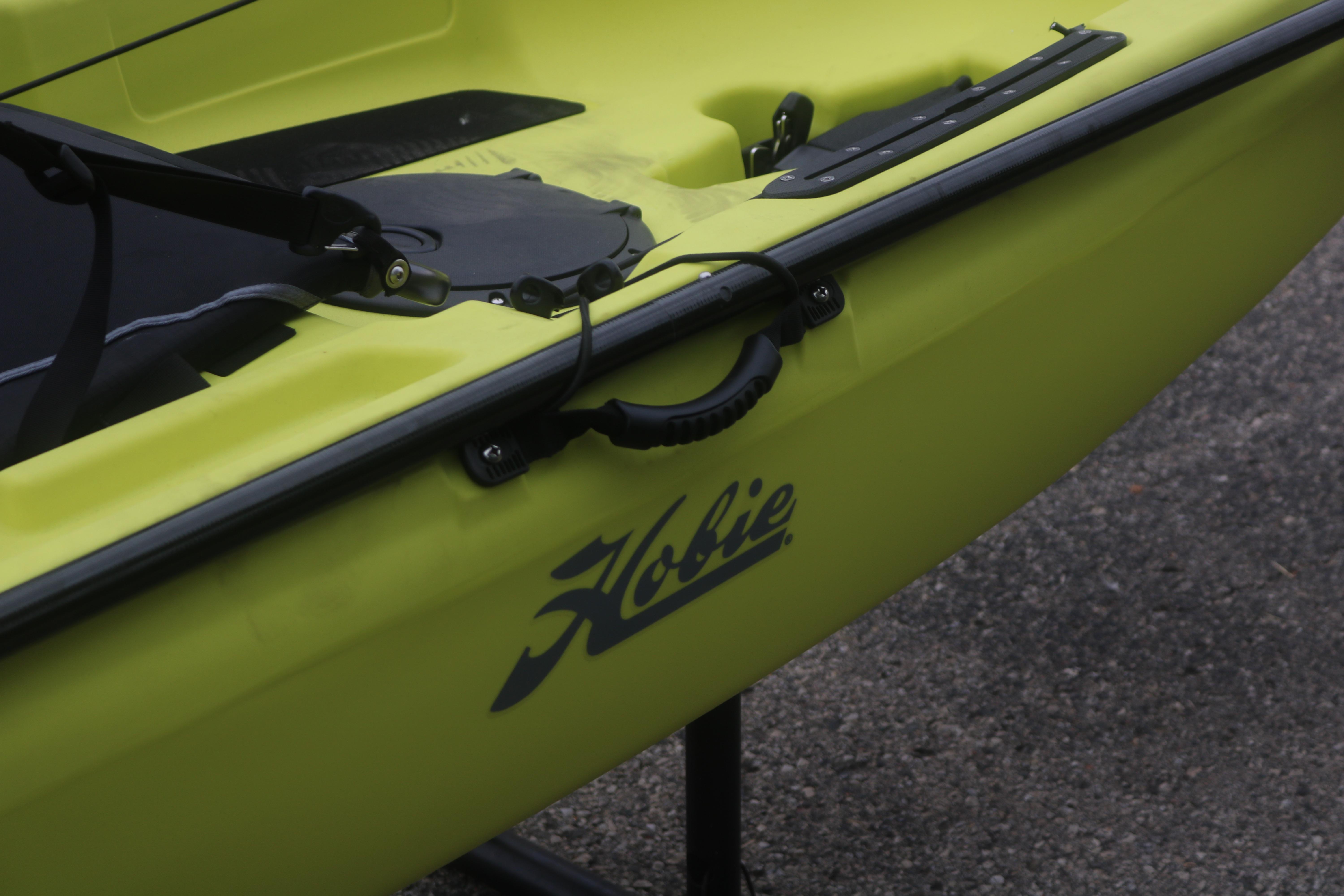 2025 Hobie Mirage Passport 12.0 R kayak in vibrant yellow, close-up view.