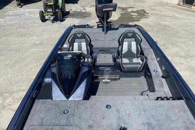 2026 Phoenix 921 ELITE boat interior with dual seats and modern dashboard.